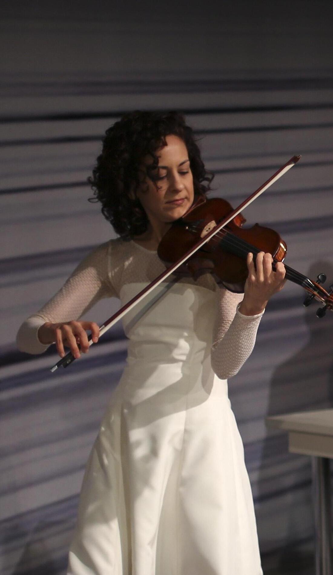 Andrea Tyniec promotional image for upcoming events and ticket sales