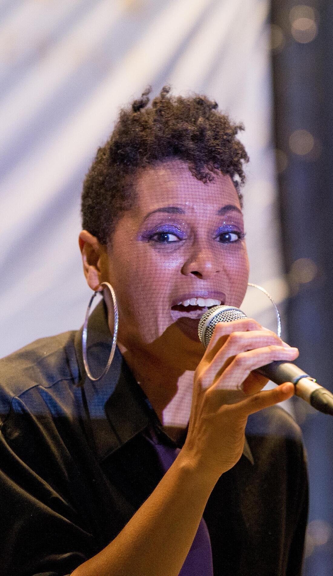 Angela Johnson promotional image for upcoming events and ticket sales