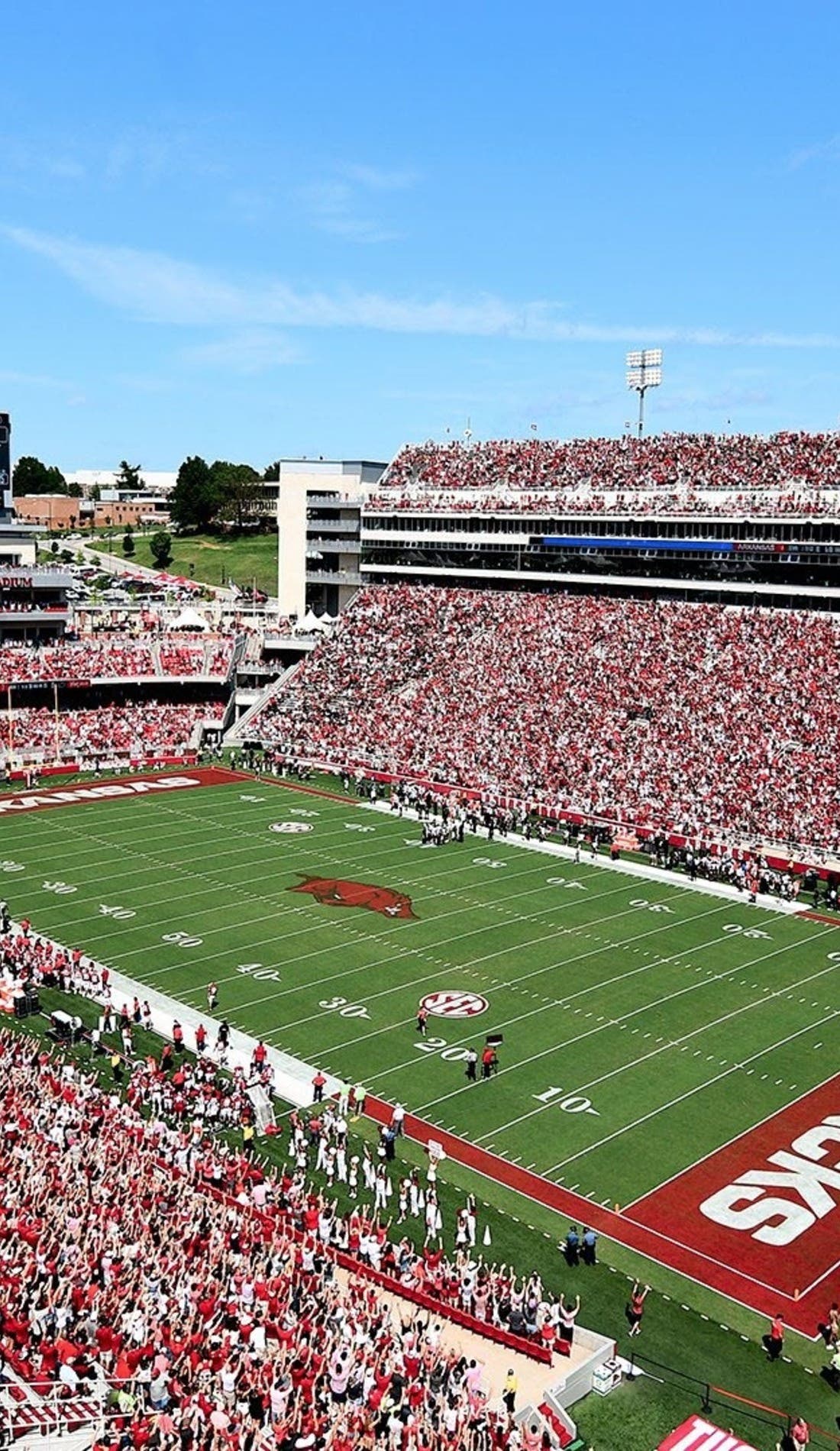 View from a seat at a Arkansas Razorbacks Football vs Western Kentucky Hilltoppers Football game, showing the teams playing