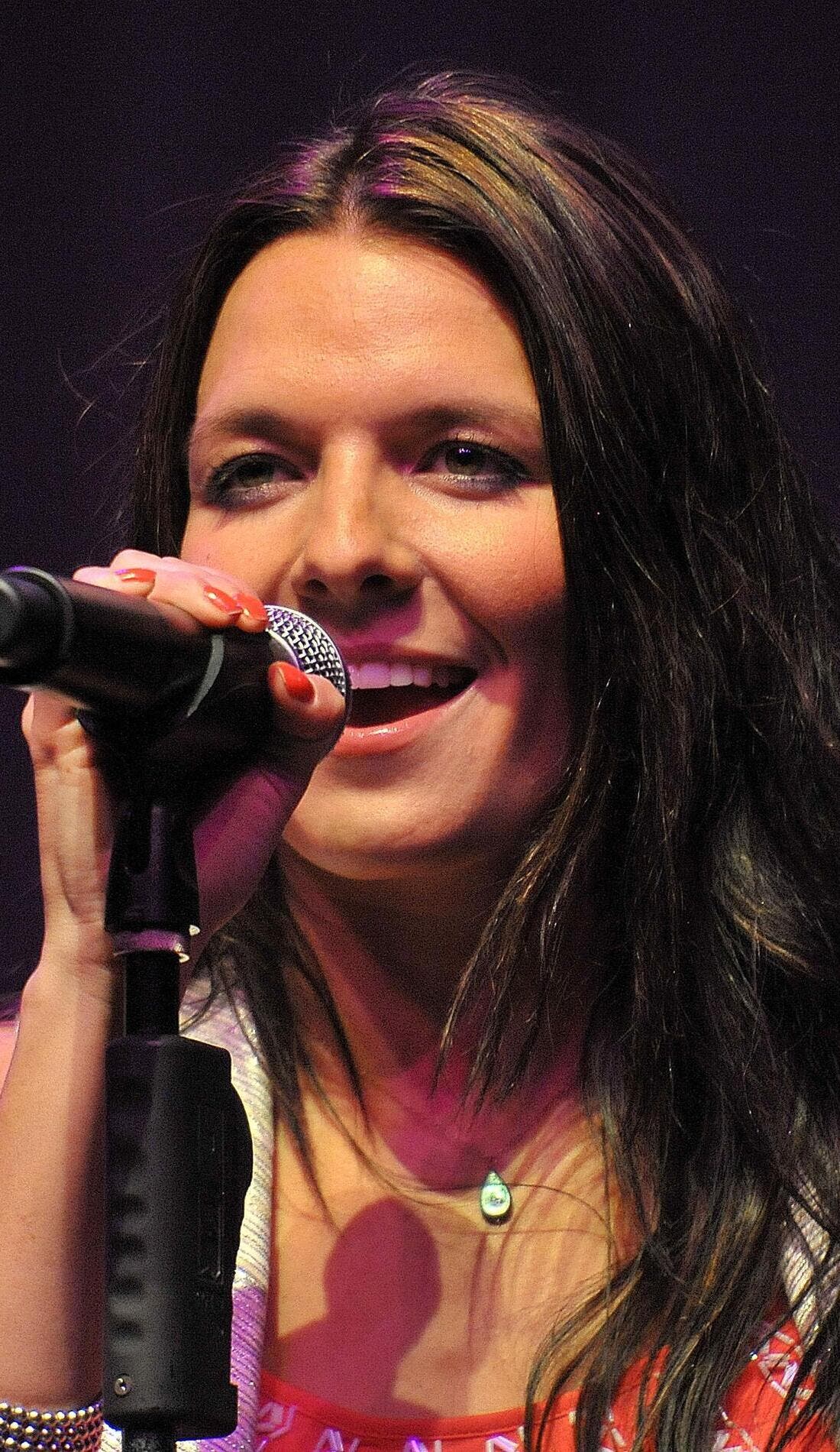 Ashlyne Huff promotional image for upcoming events and ticket sales