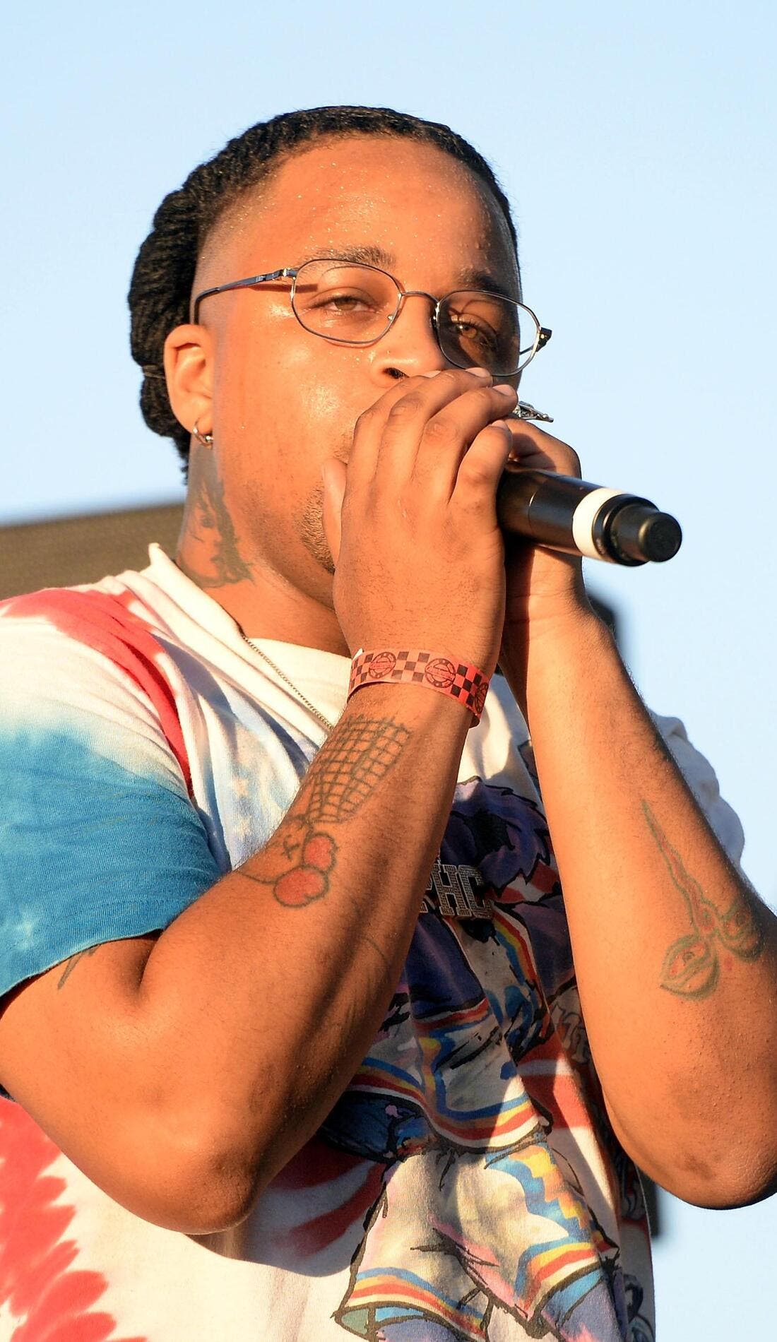 Azizi Gibson promotional image for upcoming events and ticket sales