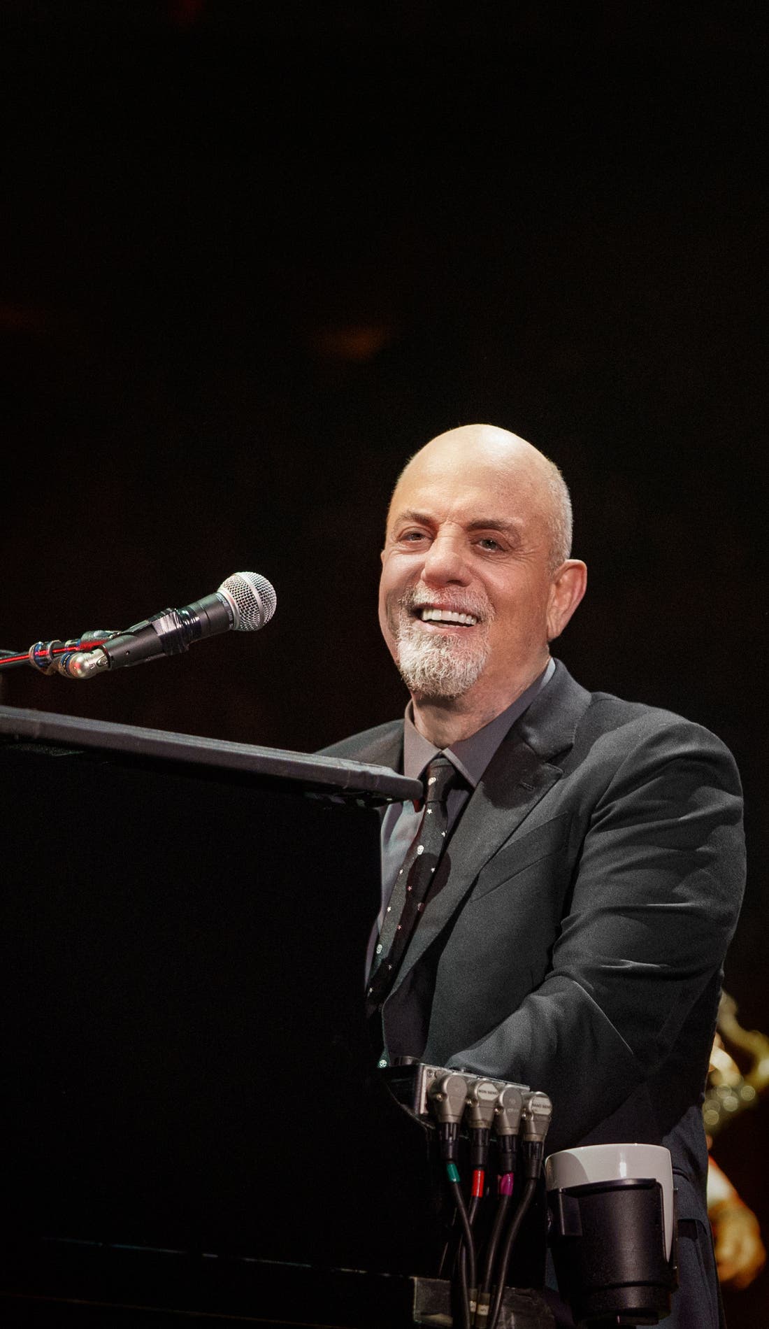 Billy Joel promotional image for upcoming events and ticket sales in New Orleans