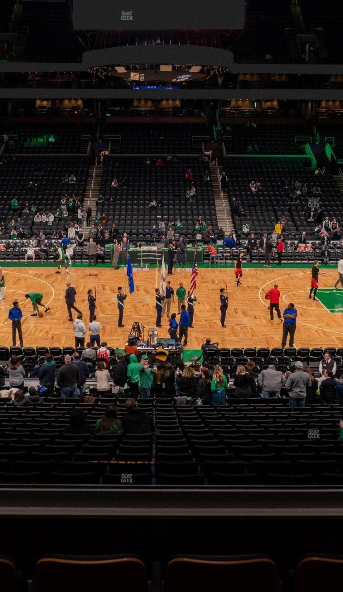 View from a seat at a Boston Celtics vs Toronto Raptors game, showing the teams playing