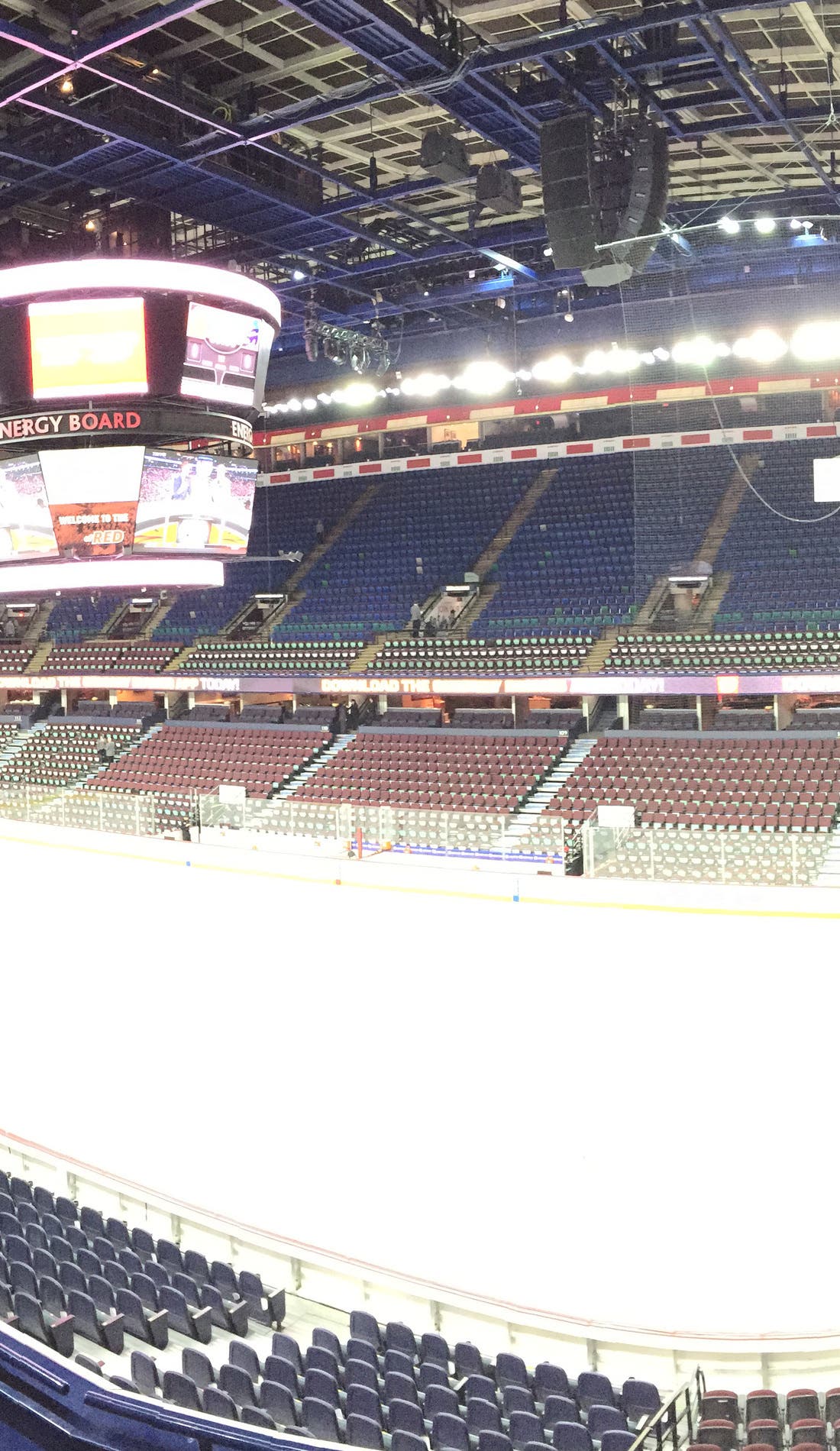 View from a seat at a Calgary Flames vs Edmonton Oilers game, showing the teams playing