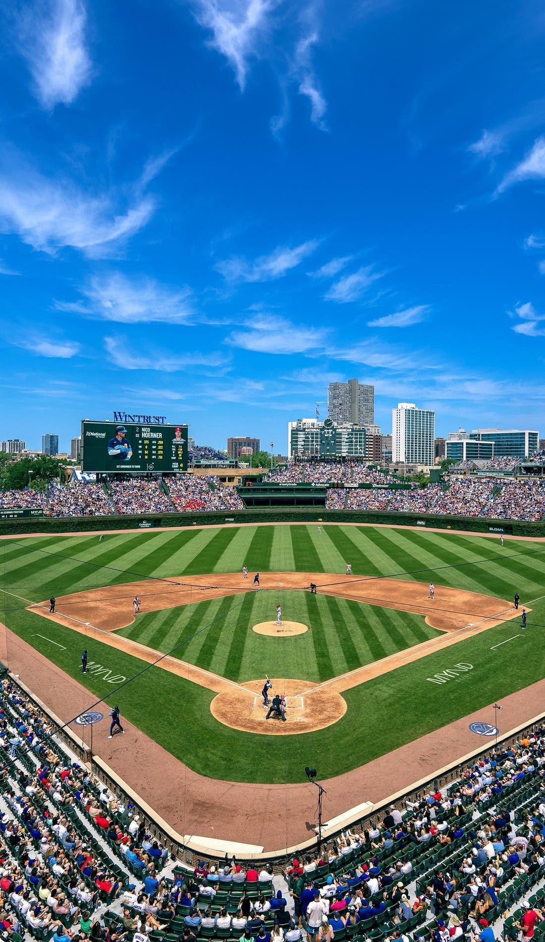 View from a seat at a Chicago Cubs vs Texas Rangers game, showing the teams playing