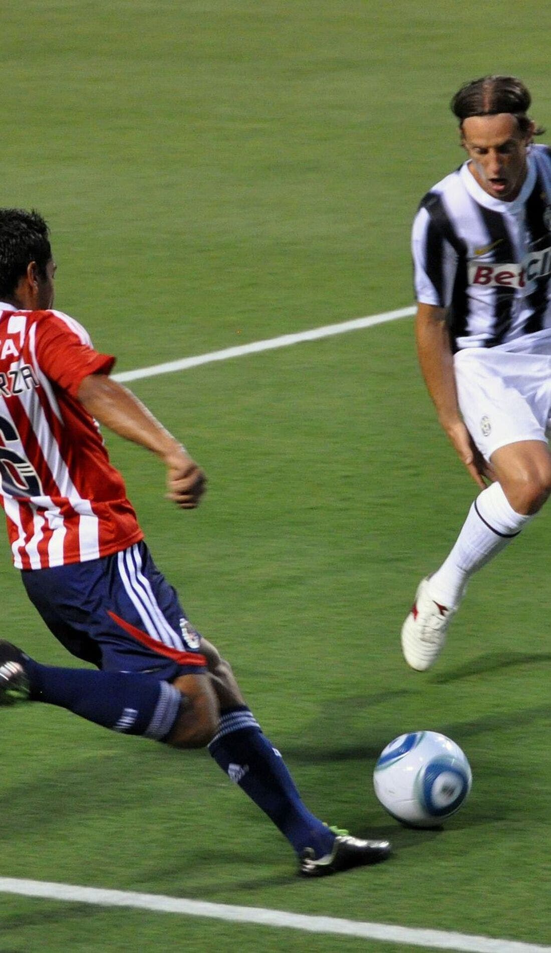 View from a seat at a Chivas de Guadalajara vs Swansea City AFC game, showing the teams playing