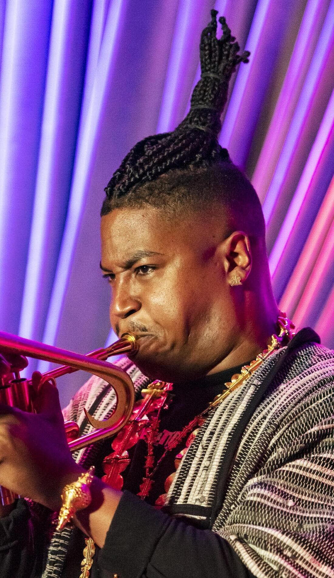 Christian Scott aTunde Adjuah promotional image for upcoming events and ticket sales