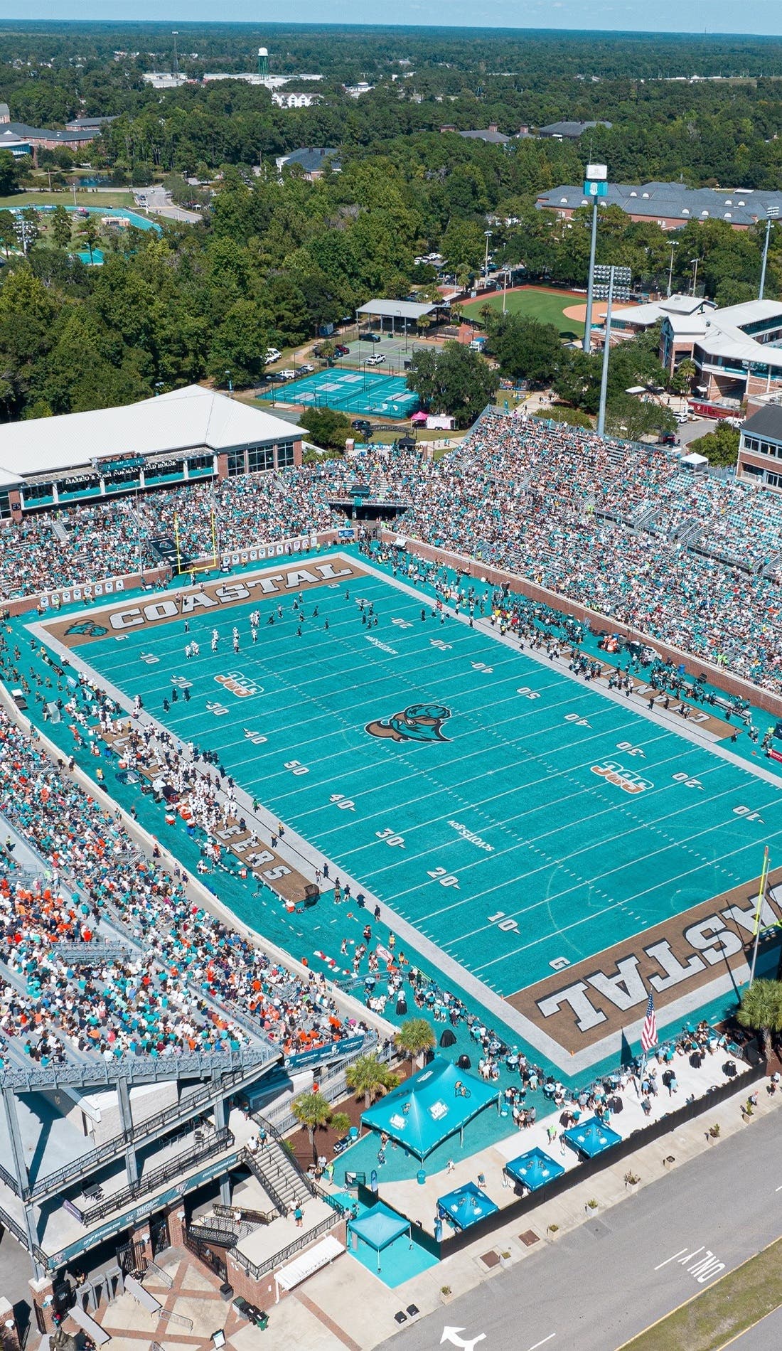 View from a seat at a Coastal Carolina Chanticleers Football vs Campbell Fighting Camels Football game, showing the teams playing