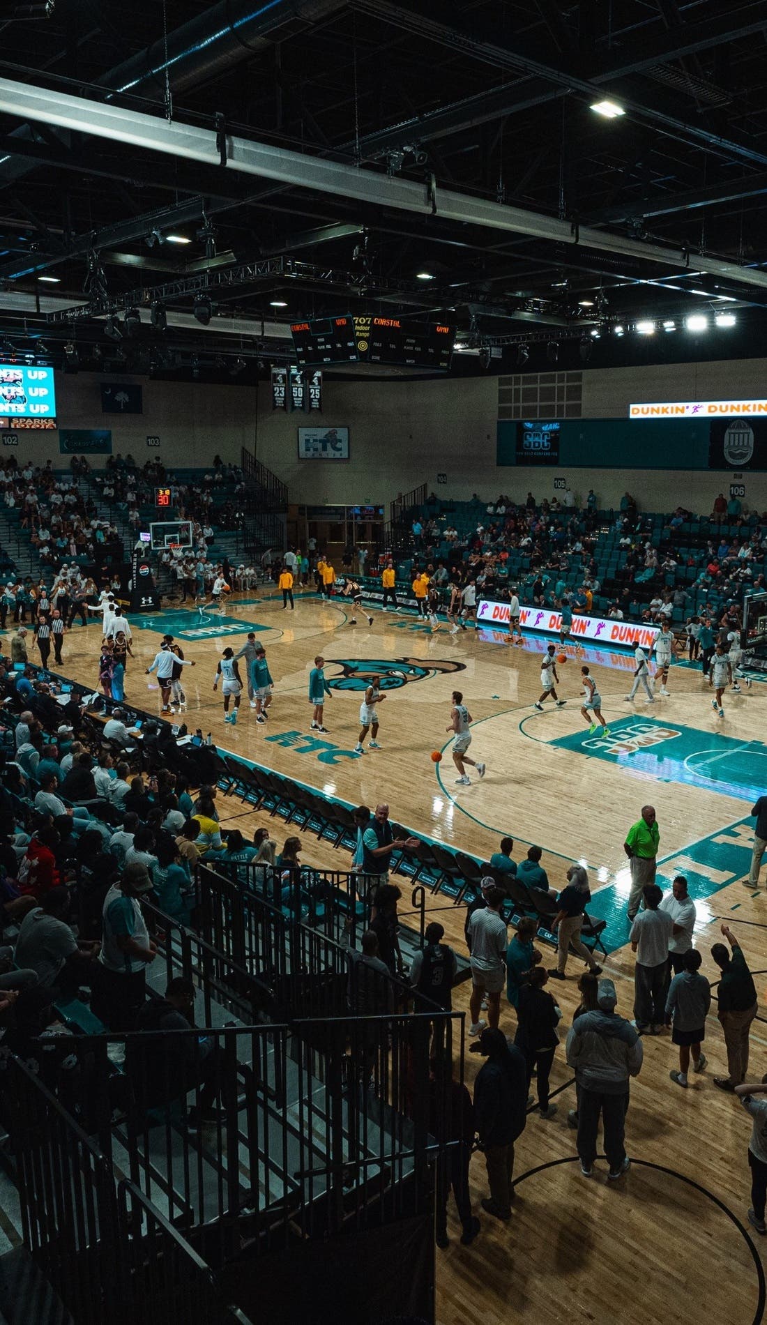 View from a seat at a Coastal Carolina Chanticleers Mens Basketball vs North Carolina Central Eagles Mens Basketball game, showing the teams playing