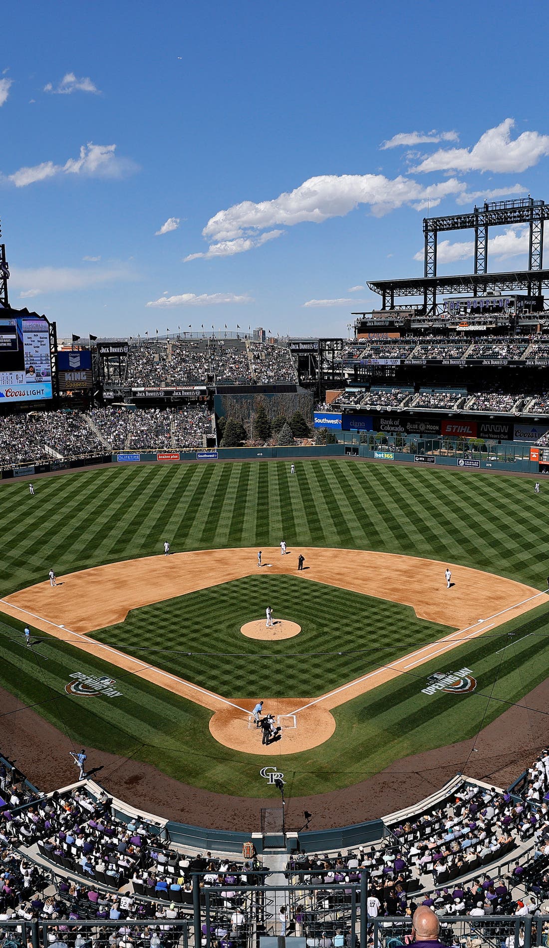 View from a seat at a Colorado Rockies vs Boston Red Sox game, showing the teams playing