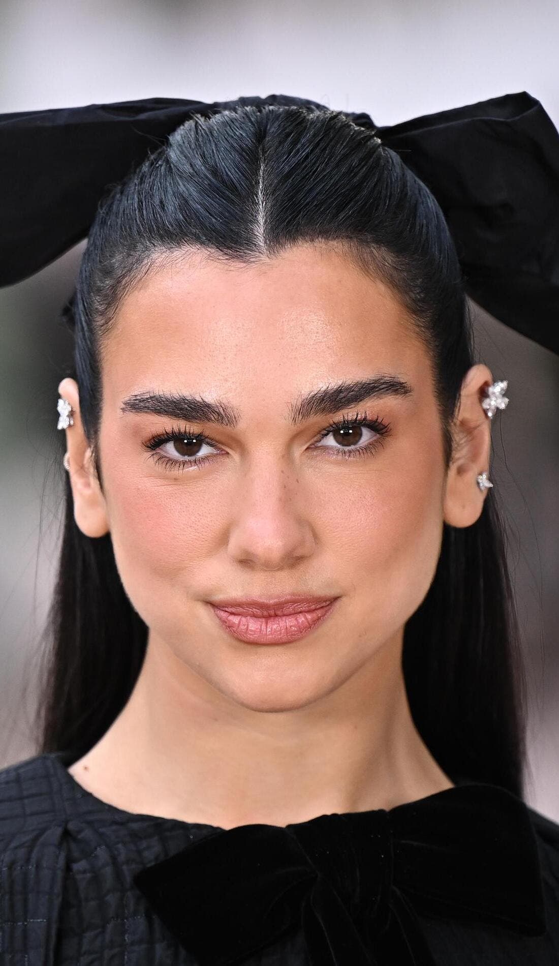 Dua Lipa promotional image for upcoming events and ticket sales