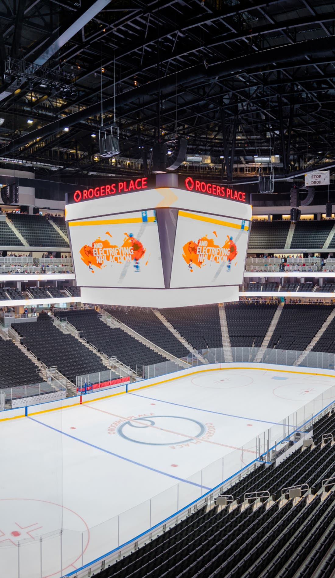 View from a seat at a Edmonton Oilers vs Minnesota Wild game, showing the teams playing