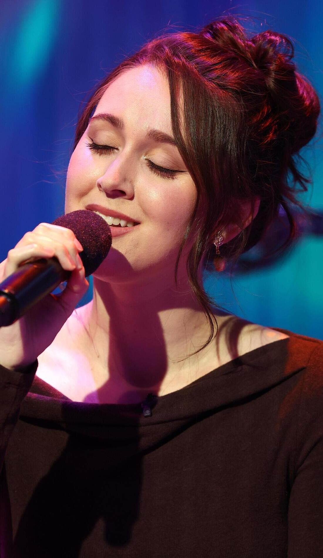 Em Beihold promotional image for upcoming events and ticket sales