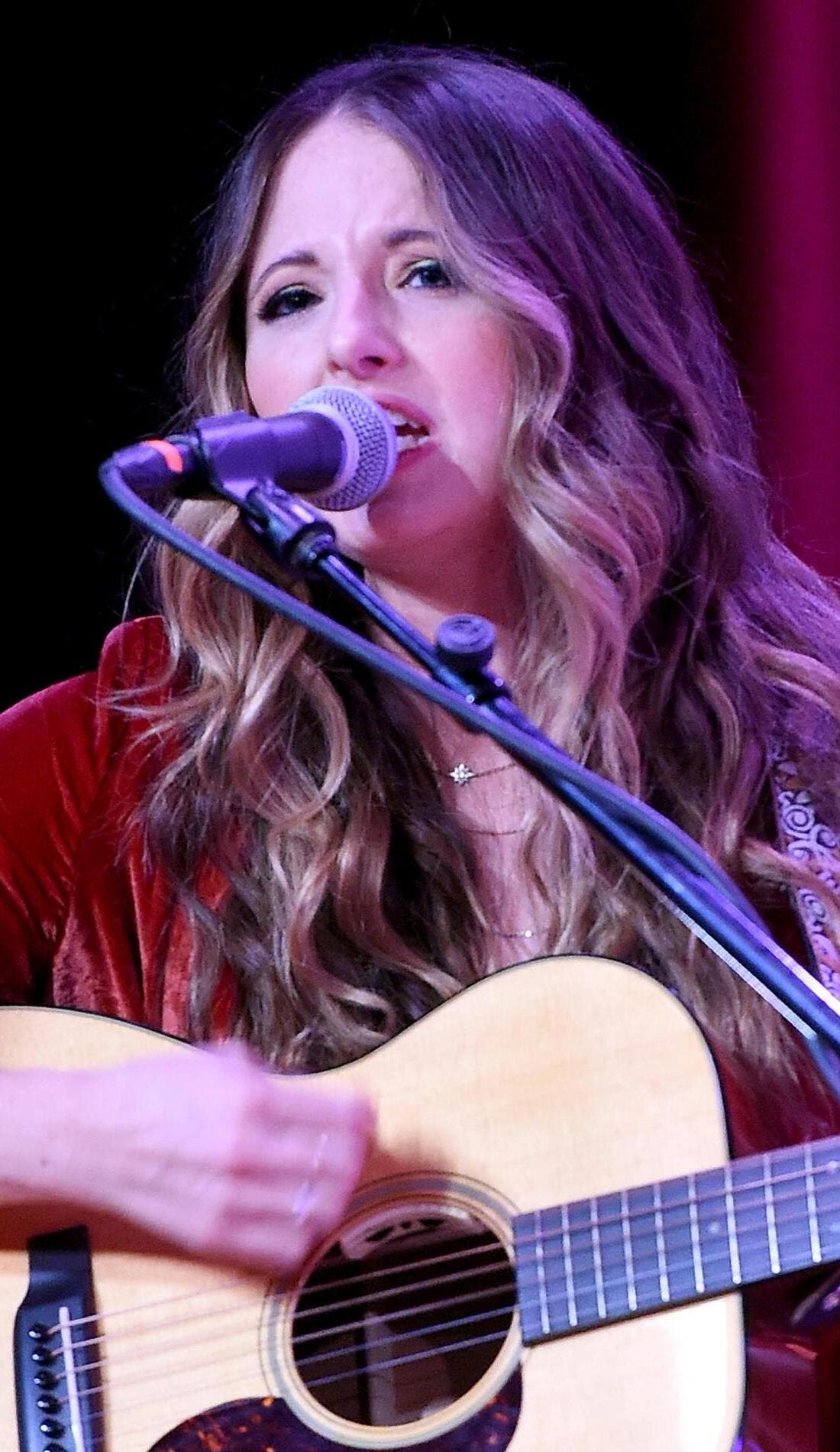 Emily Hackett promotional image for upcoming events and ticket sales
