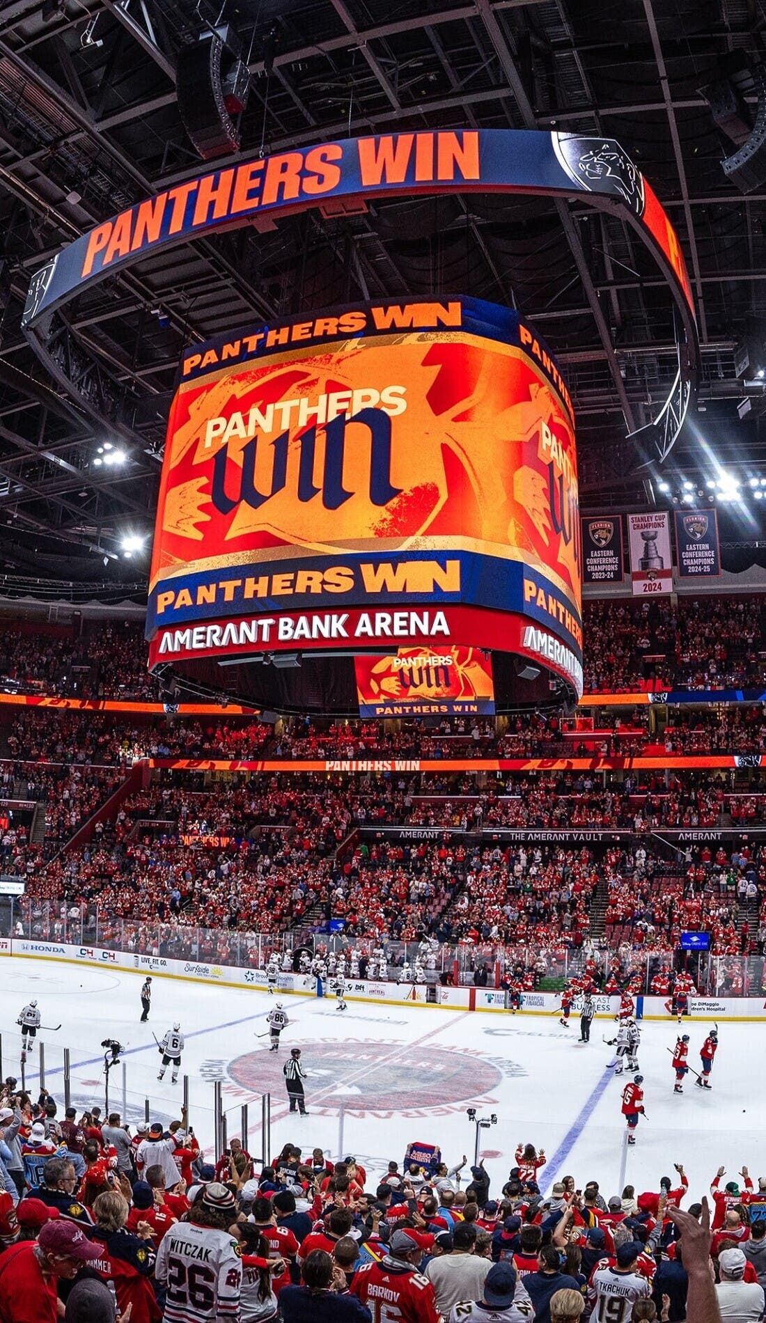 View from a seat at a Florida Panthers vs Minnesota Wild game, showing the teams playing