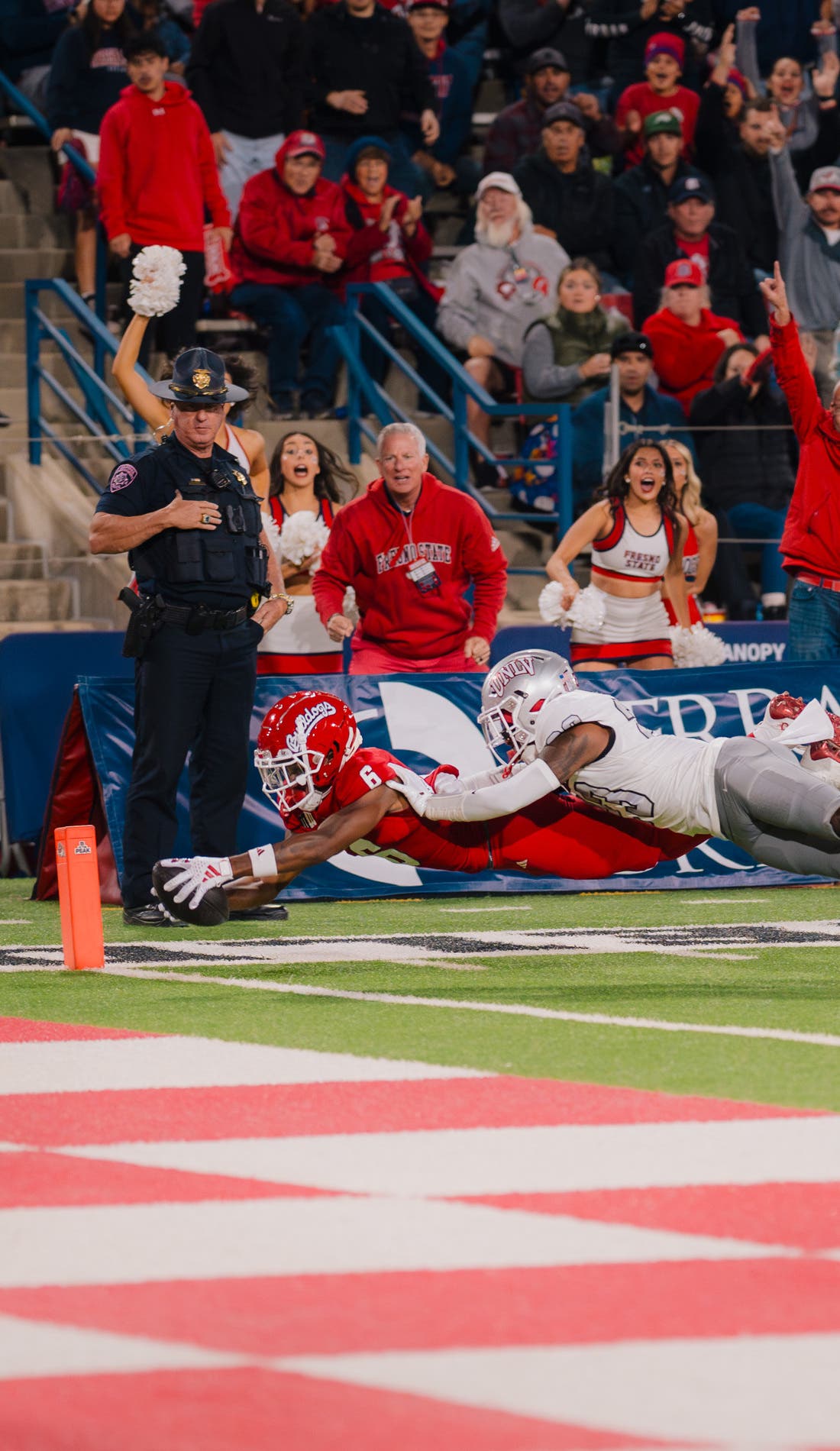 View from a seat at a Fresno State Bulldogs Football vs Cal Poly Mustangs Football game, showing the teams playing