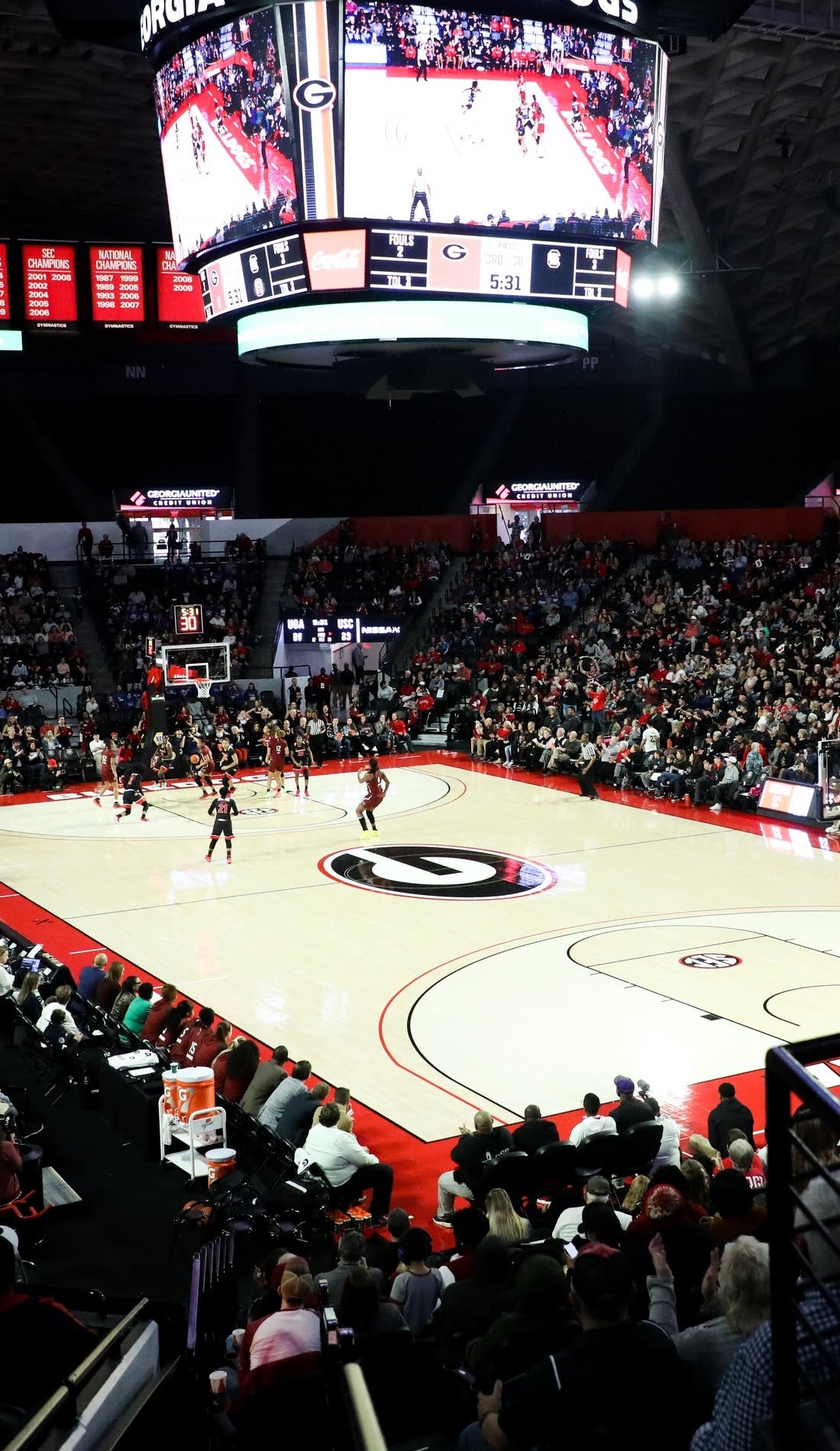 View from a seat at a Georgia Bulldogs Womens Basketball vs LSU Tigers Womens Basketball game, showing the teams playing