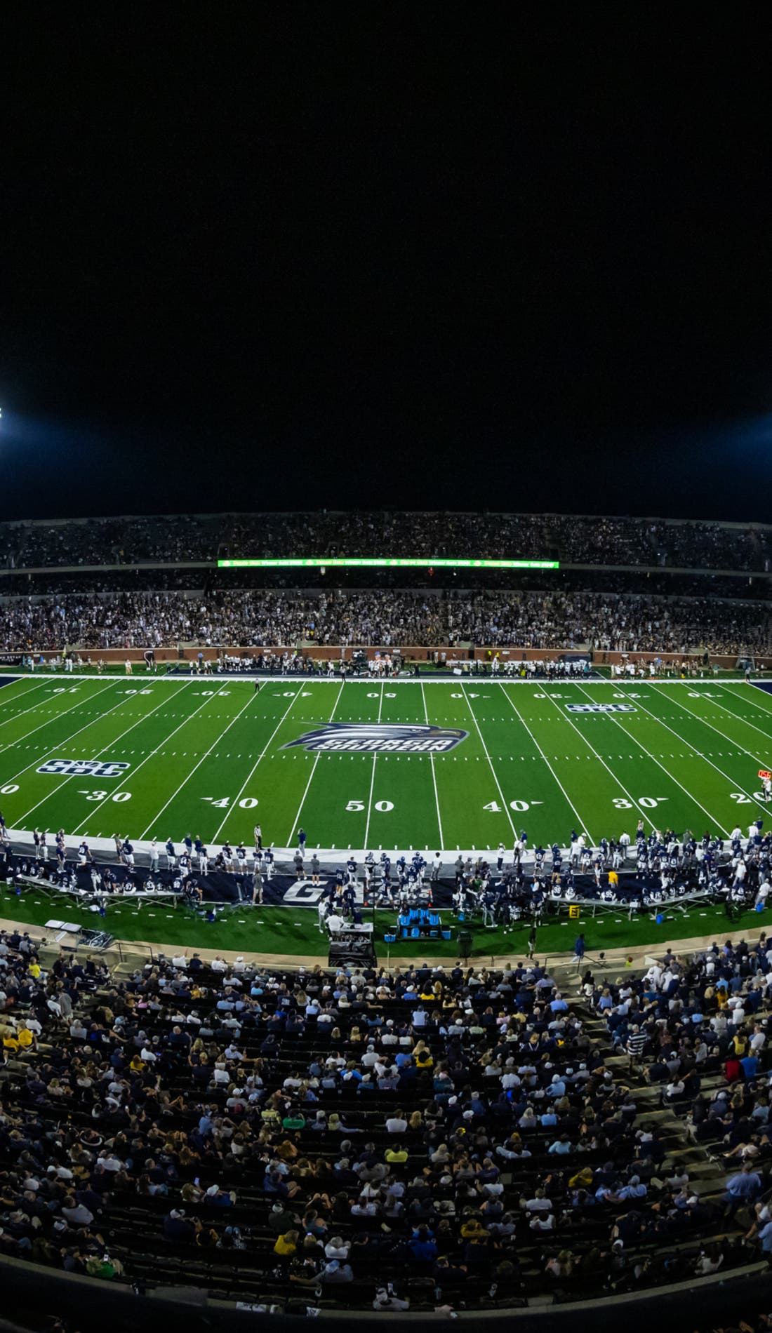 View from a seat at a Georgia Southern Eagles Football vs LSU Tigers Football game, showing the teams playing