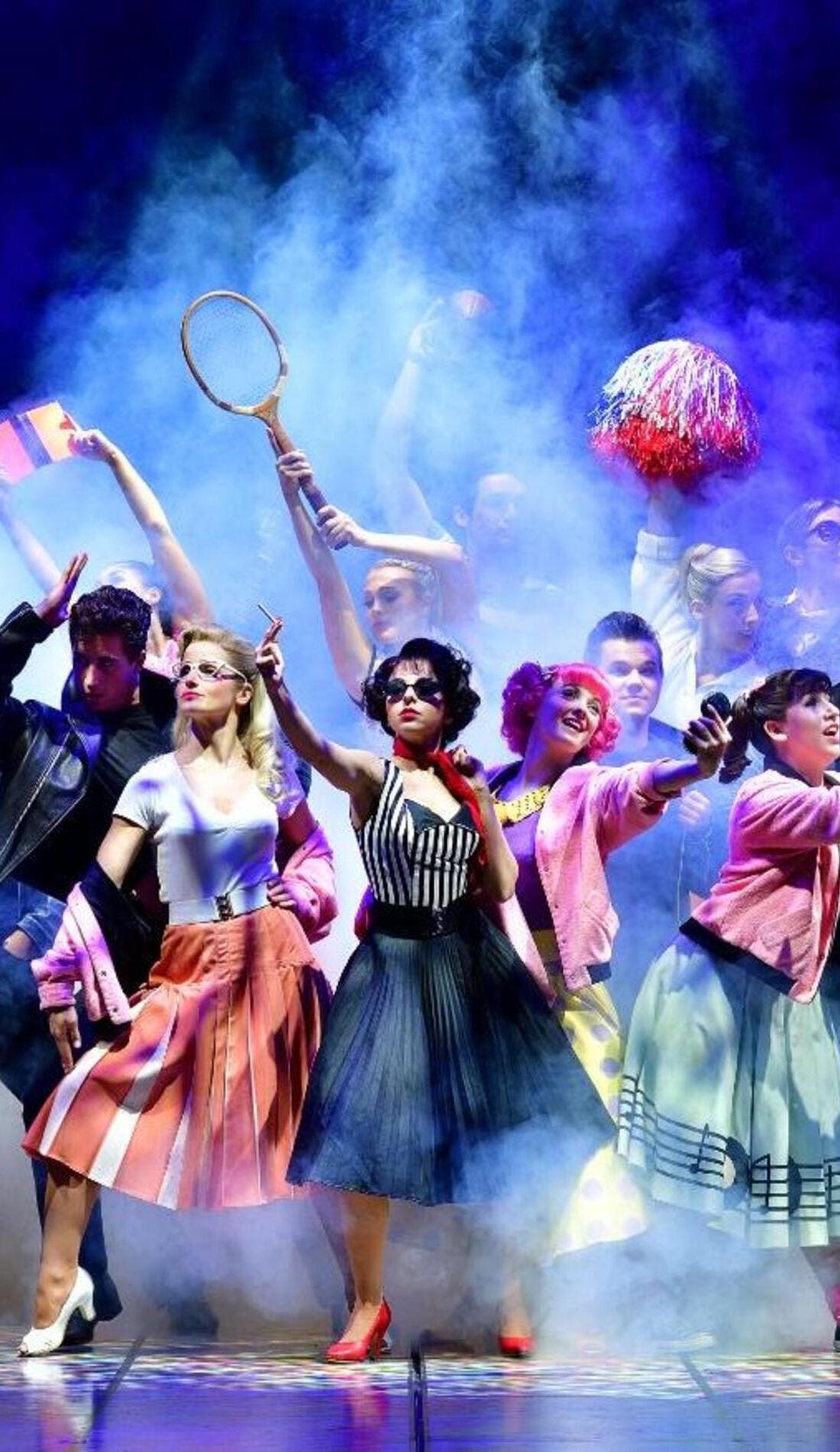 Grease promotional image for upcoming events and ticket sales in Boston