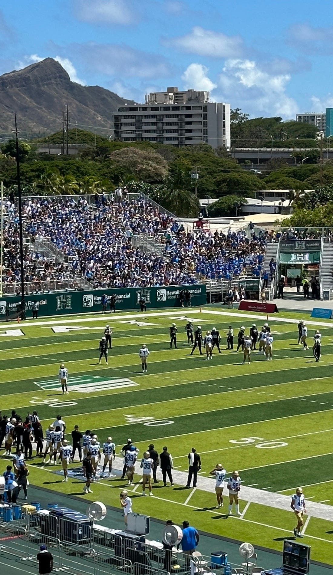 View from a seat at a Hawaii Rainbow Warriors Football vs Duquesne Dukes Football game, showing the teams playing