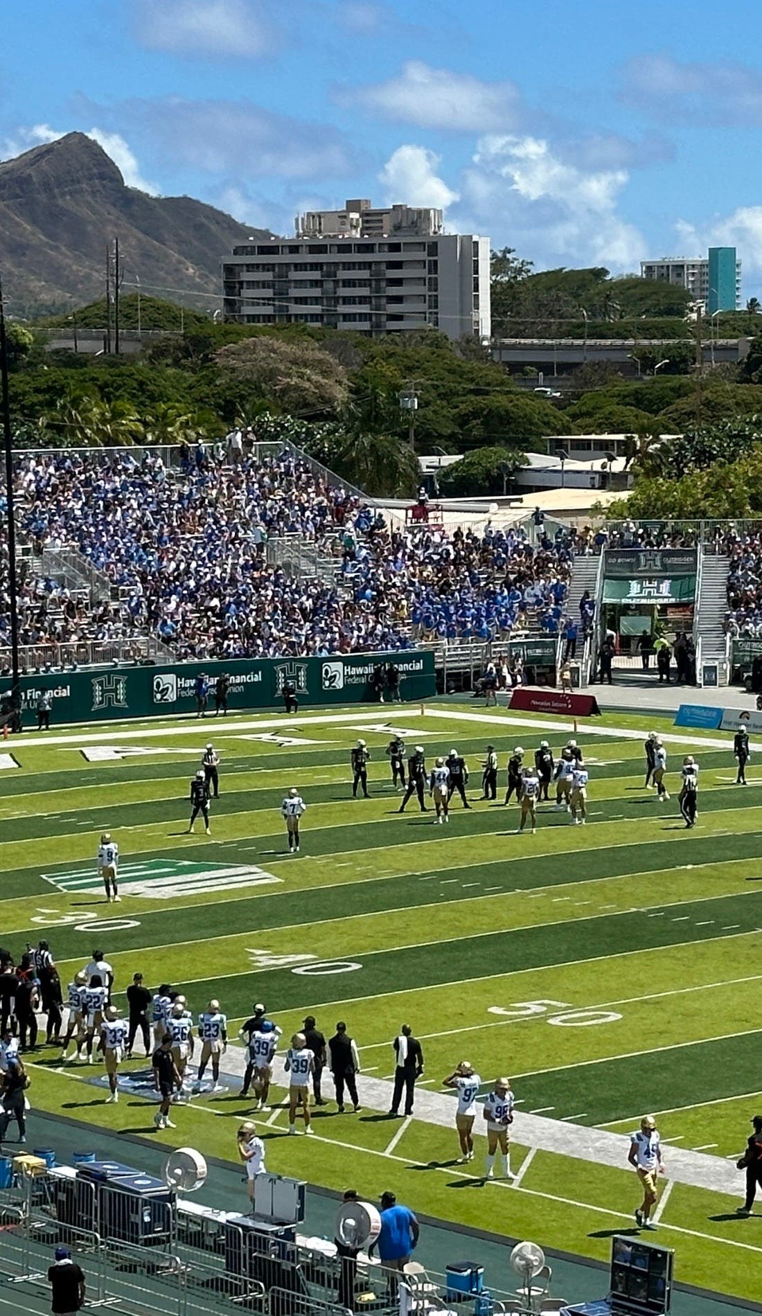 View from a seat at a Hawaii Rainbow Warriors Football vs San Jose State Spartans Football game, showing the teams playing