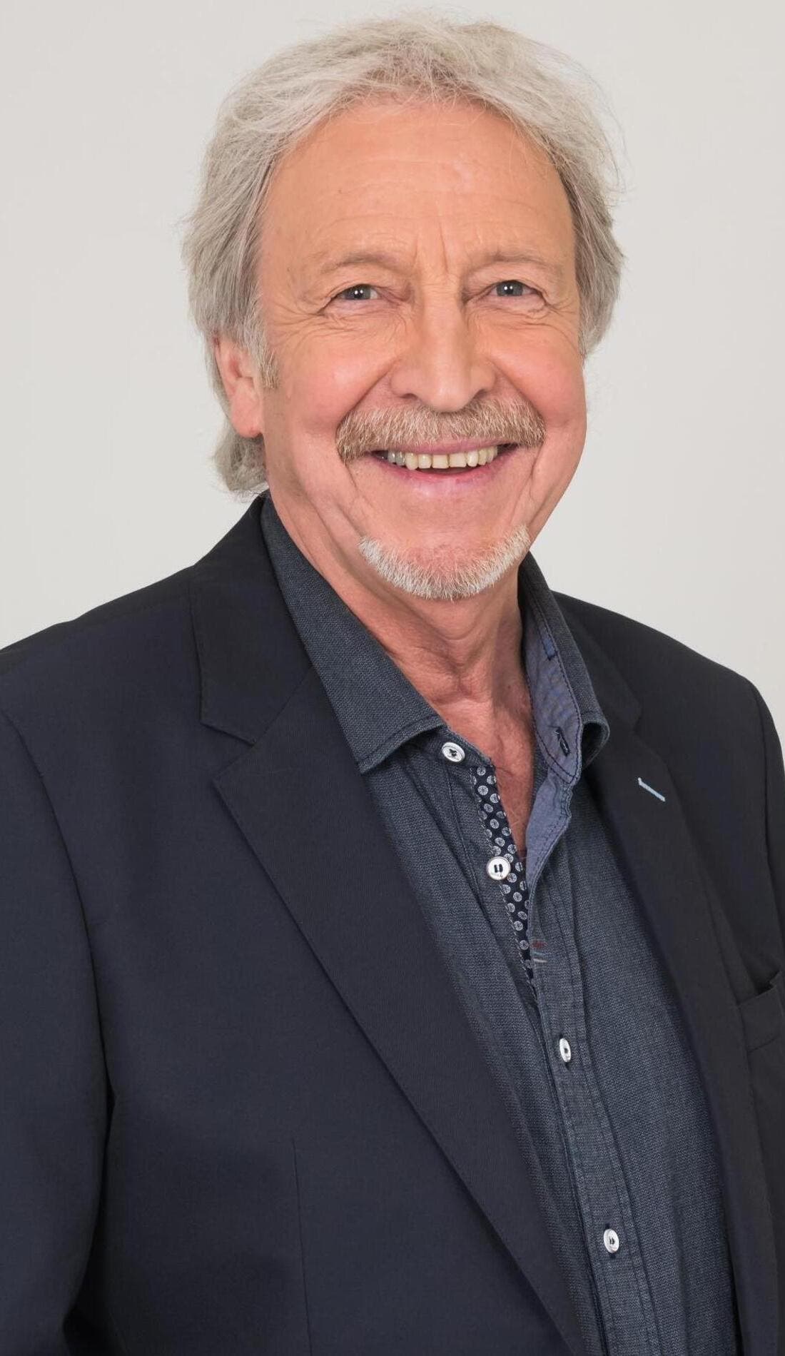 Henri Des promotional image for upcoming events and ticket sales