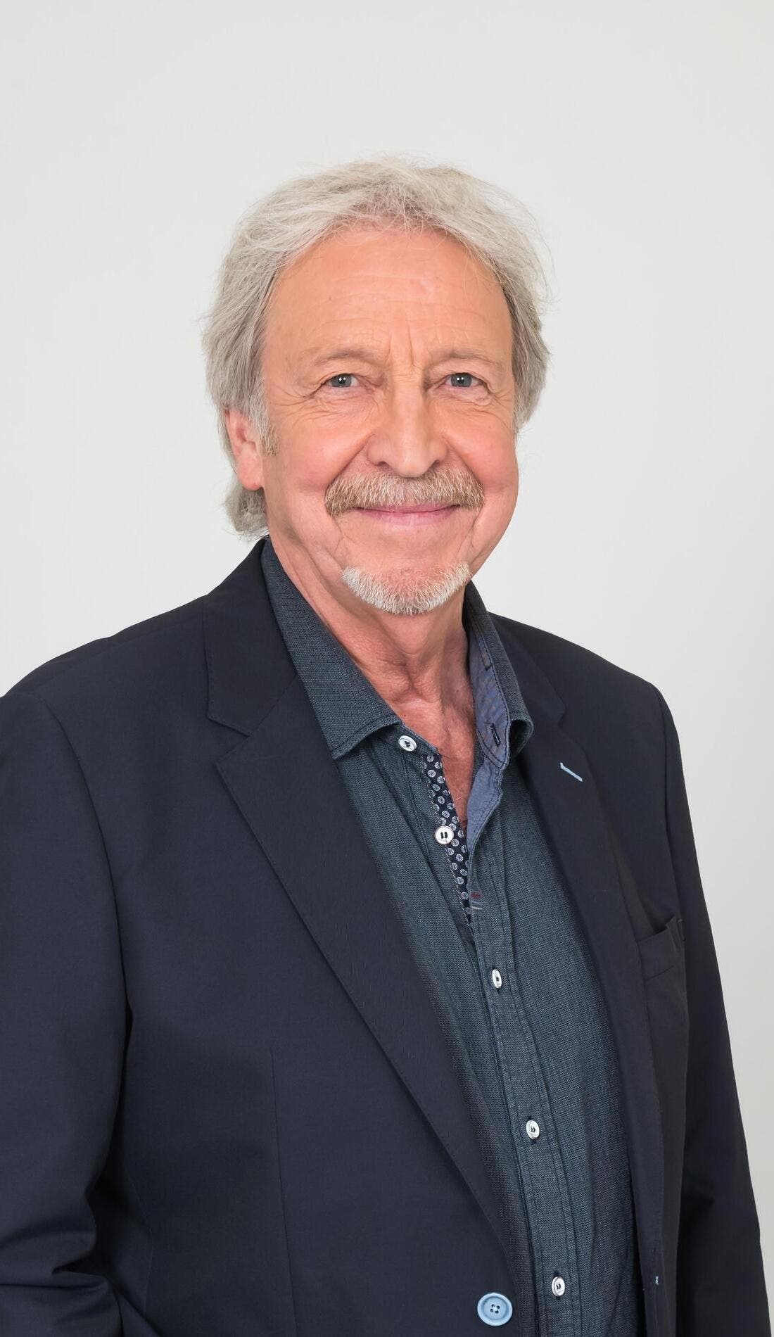 Henri Des promotional image for upcoming events and ticket sales