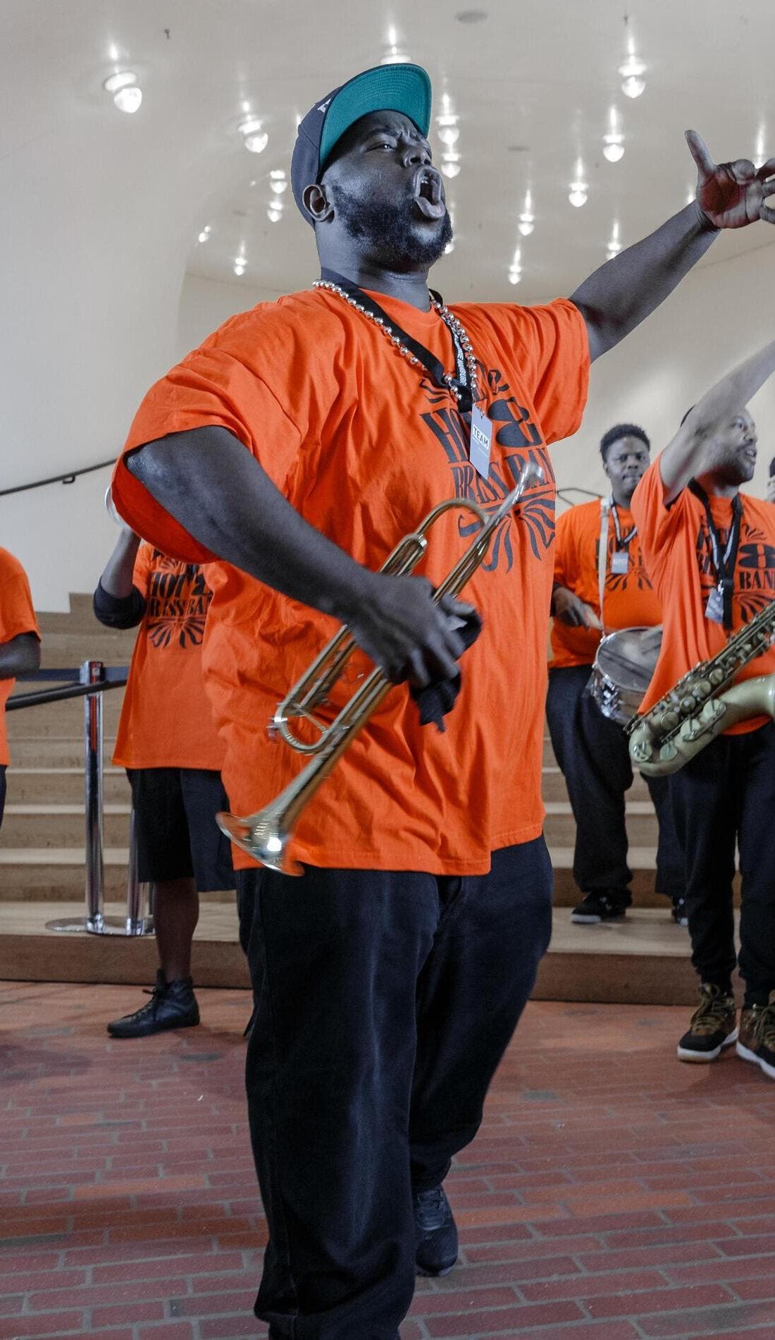 Hot 8 Brass Band promotional image for upcoming events and ticket sales