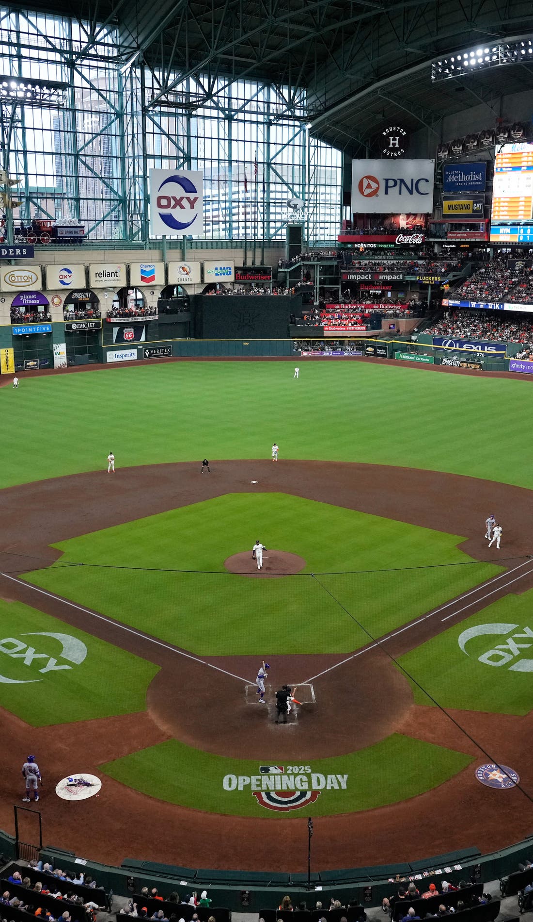 View from a seat at a Houston Astros vs Cincinnati Reds game, showing the teams playing