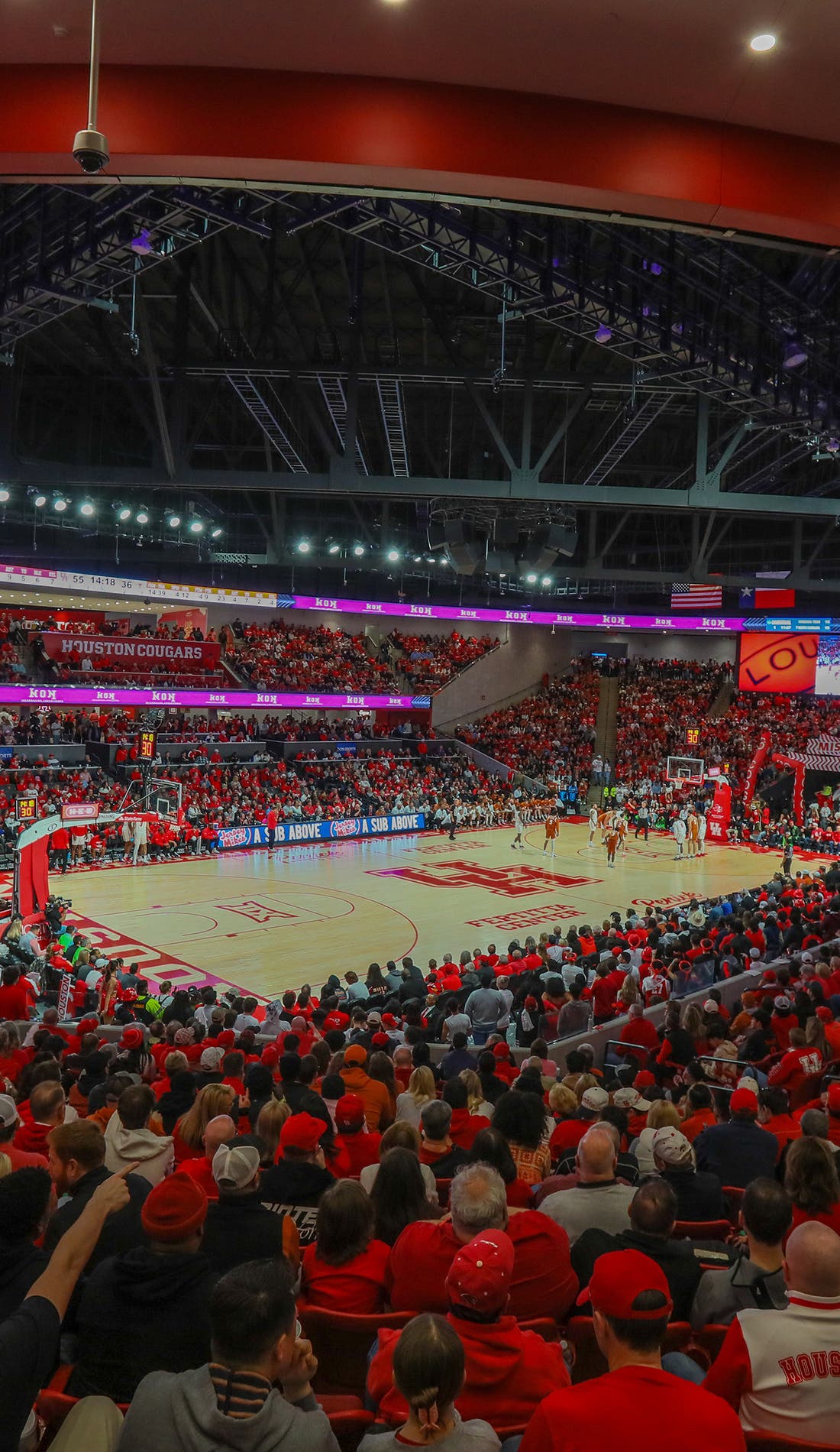 View from a seat at a Houston Cougars Mens Basketball vs Arkansas Razorbacks Mens Basketball game, showing the teams playing