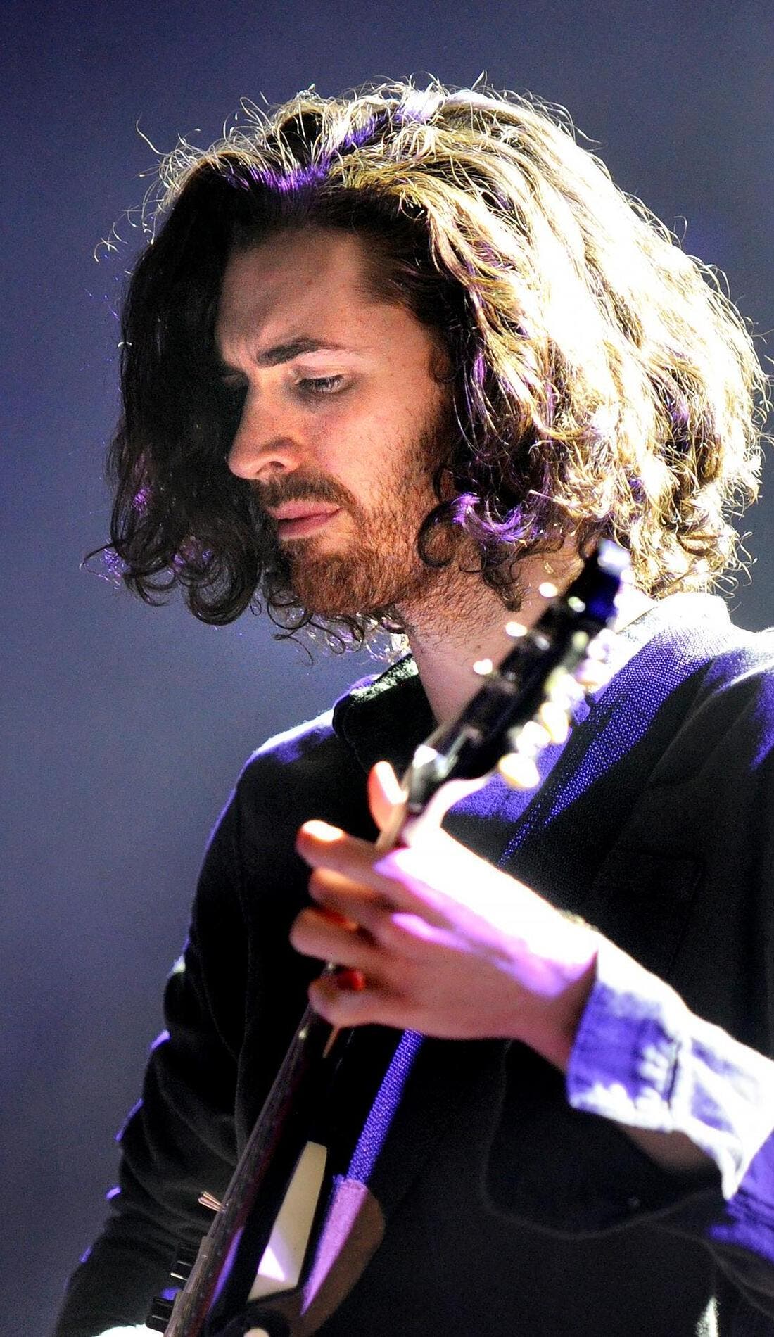Hozier promotional image for upcoming events and ticket sales in Calgary