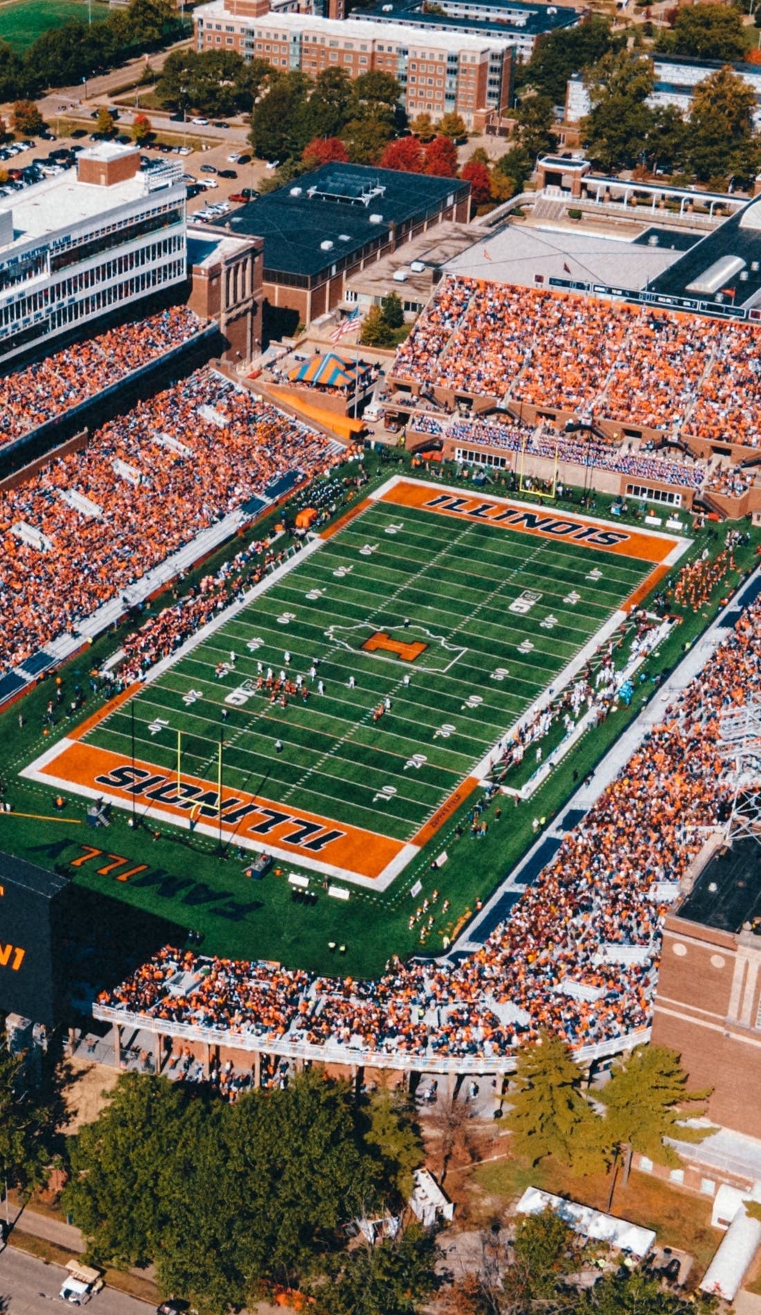 View from a seat at a Illinois Fighting Illini Football vs South Dakota State Jackrabbits Football game, showing the teams playing