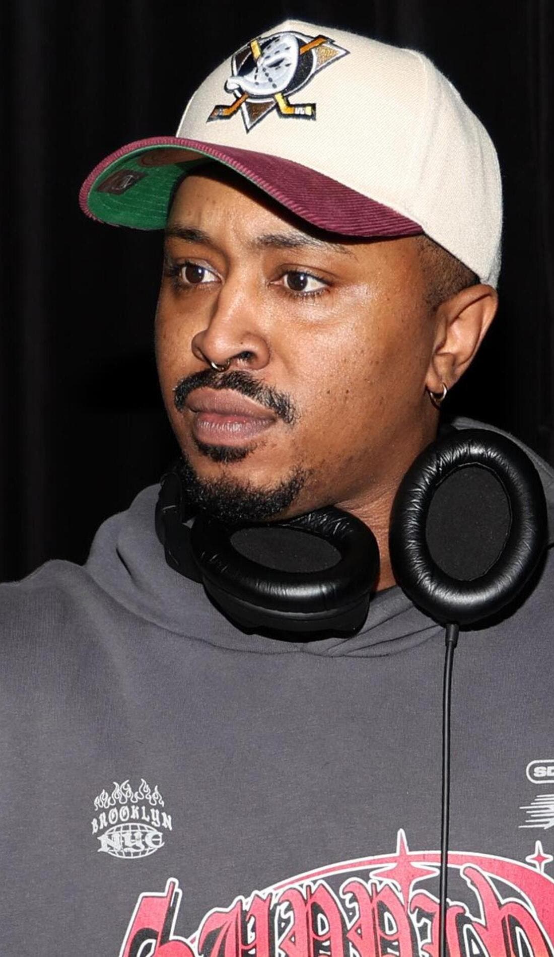 Iman Omari promotional image for upcoming events and ticket sales