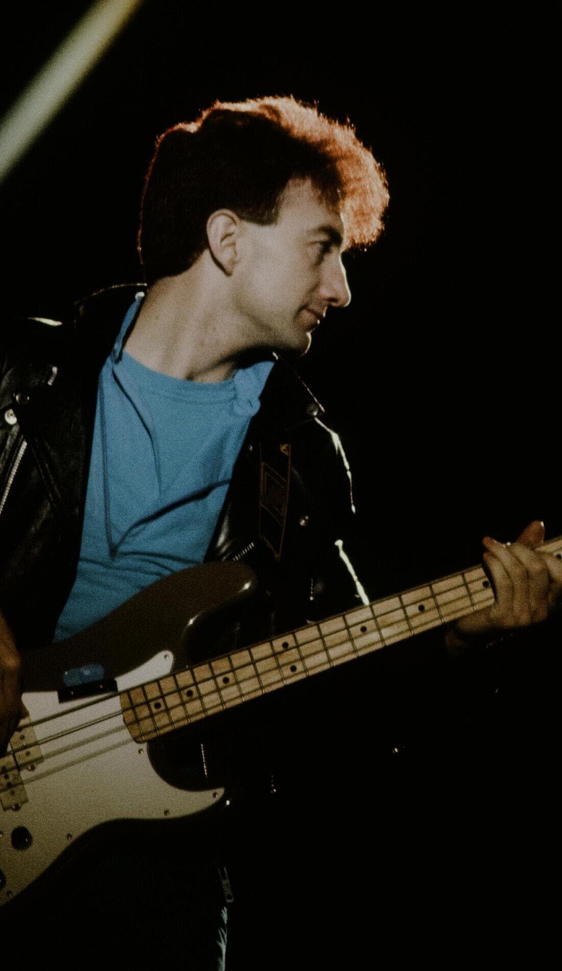John Deacon promotional image for upcoming events and ticket sales