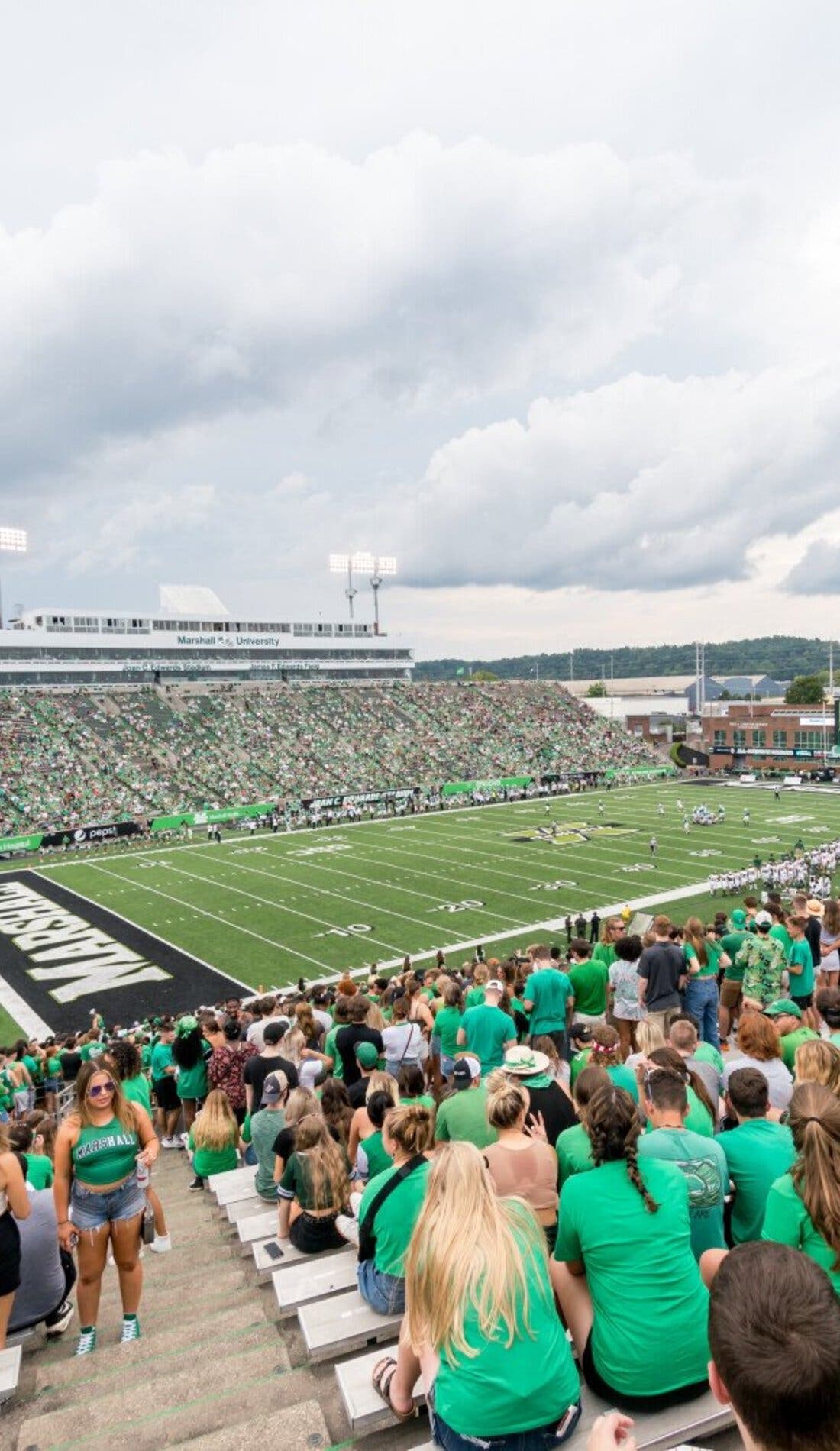 View from a seat at a Marshall Thundering Herd Football vs Rhode Island Rams Football game, showing the teams playing