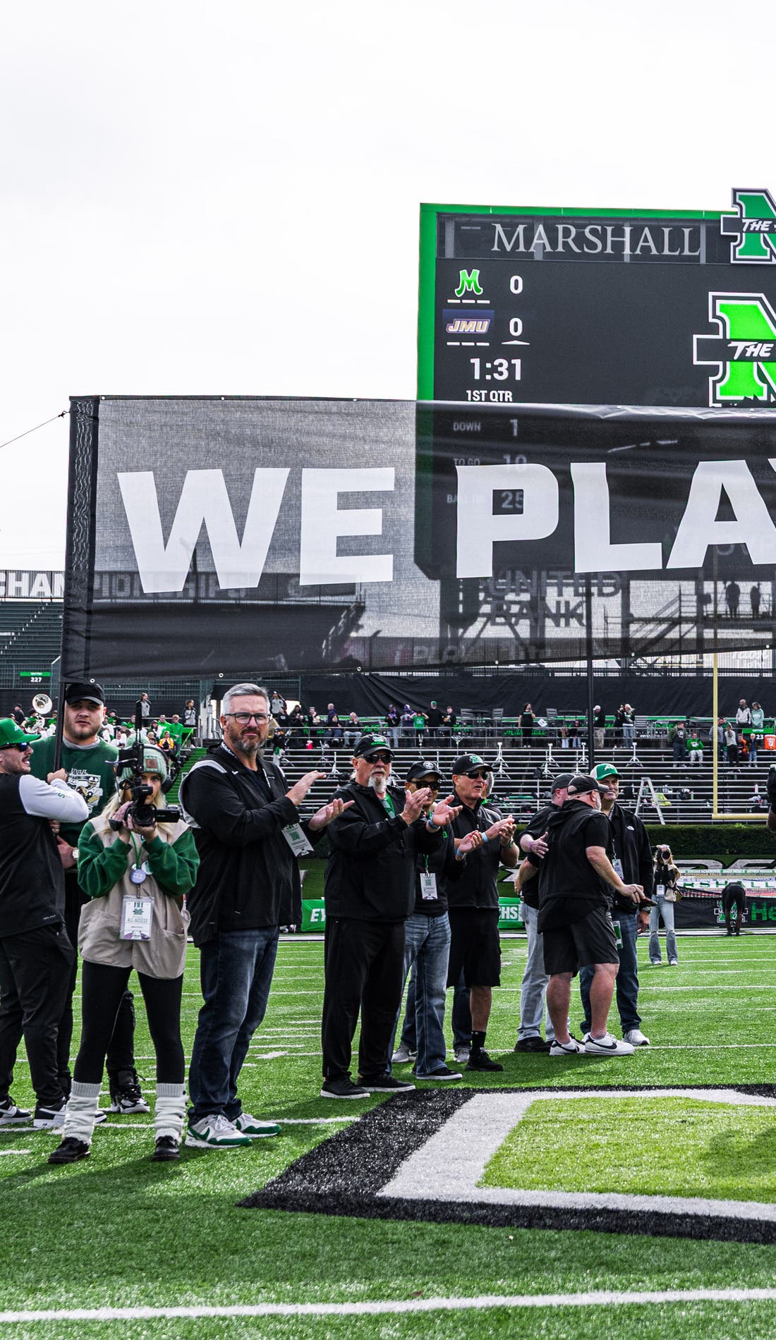 View from a seat at a Marshall Thundering Herd Football vs Navy Midshipmen Football game, showing the teams playing