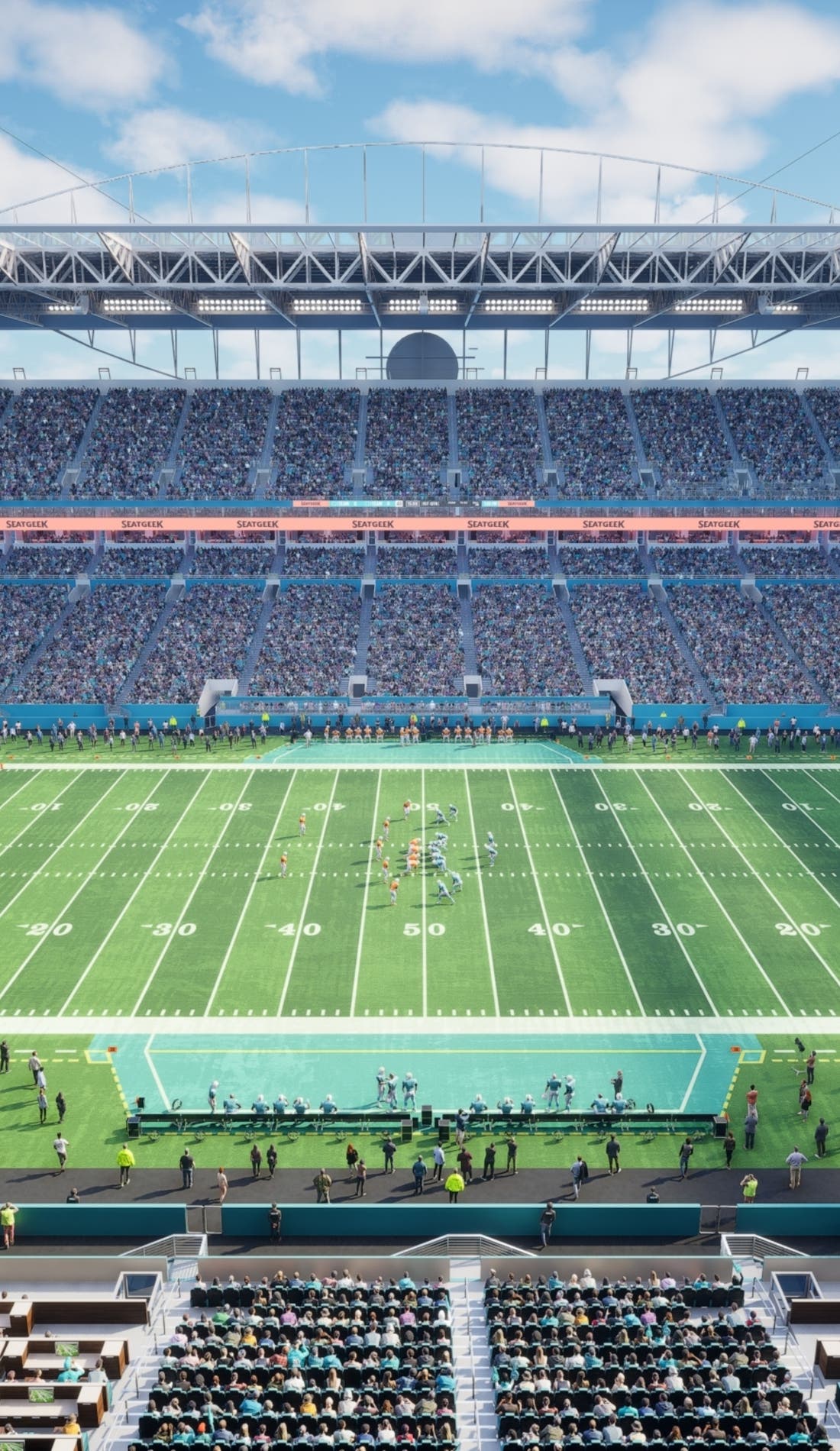 View from a seat at a Miami Dolphins vs New England Patriots game, showing the teams playing