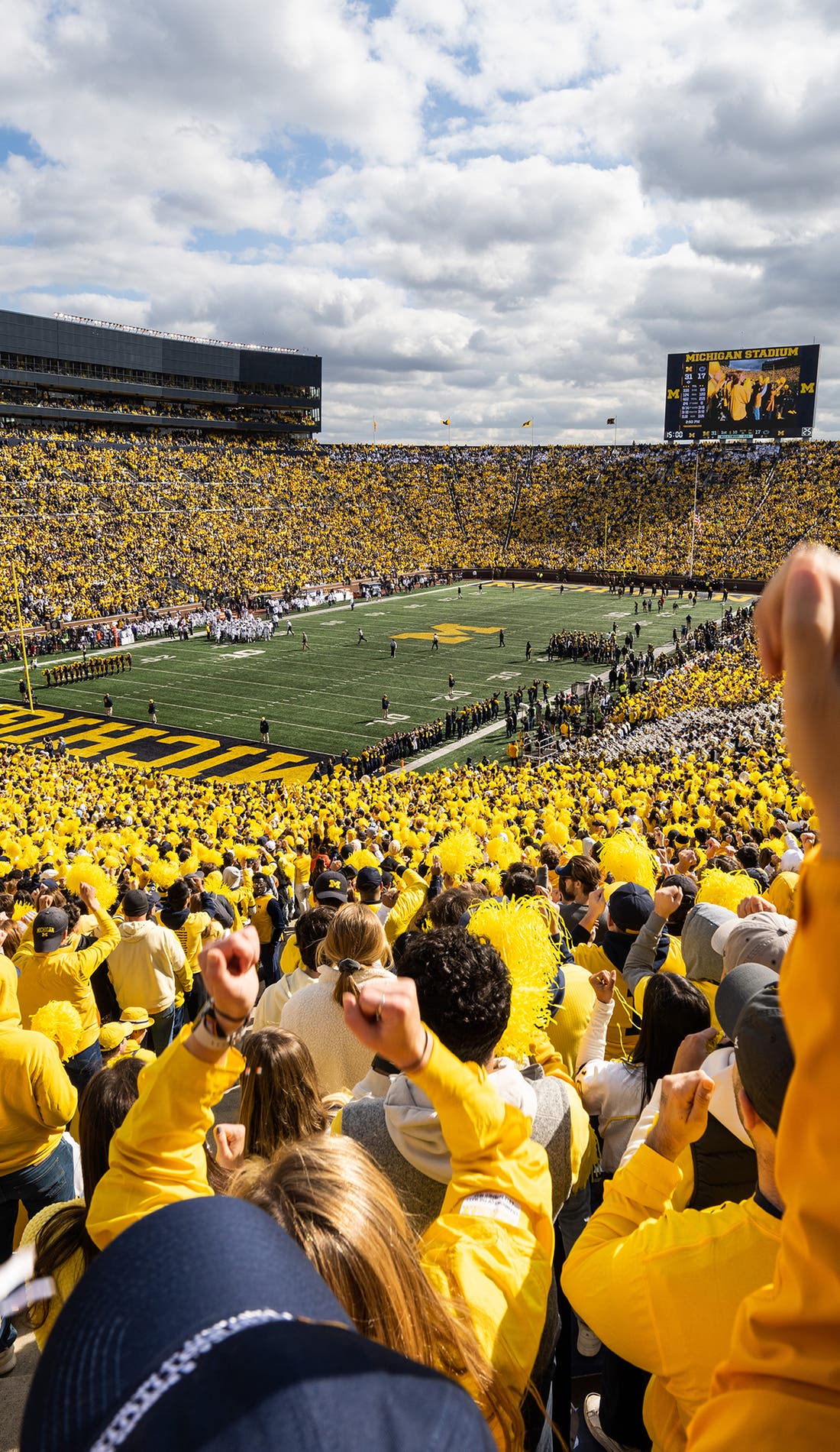 View from a seat at a Michigan Wolverines Football vs Florida Gators Football game, showing the teams playing