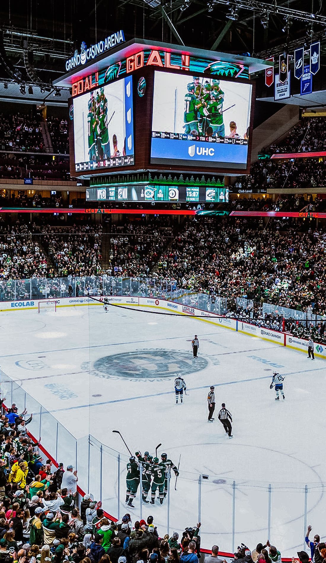View from a seat at a Minnesota Wild vs Dallas Stars game, showing the teams playing