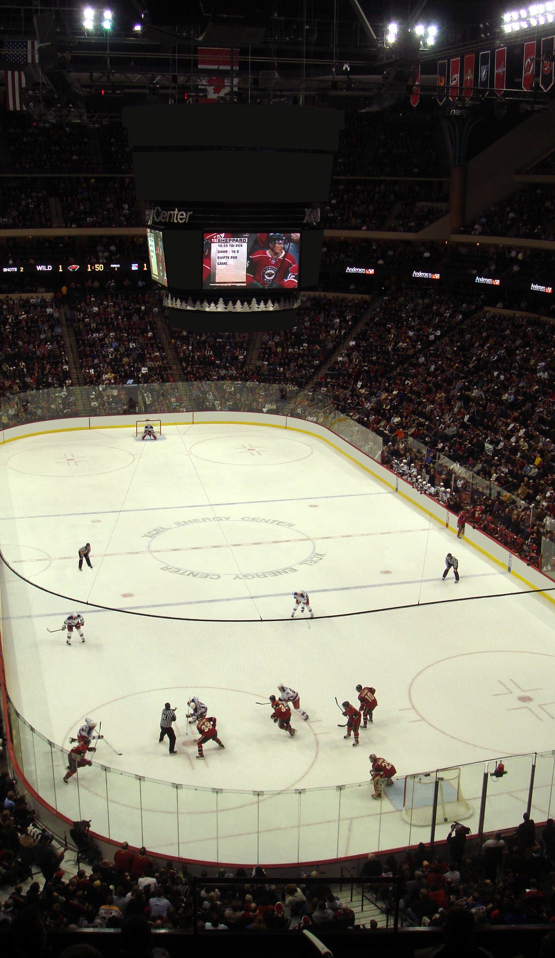 View from a seat at a Minnesota Wild vs San Jose Sharks game, showing the teams playing