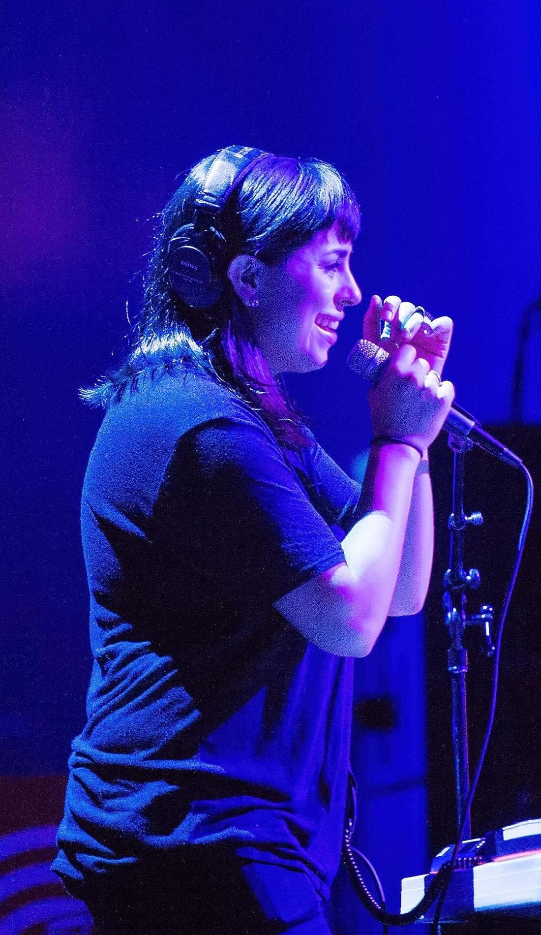 Natasha Kmeto promotional image for upcoming events and ticket sales