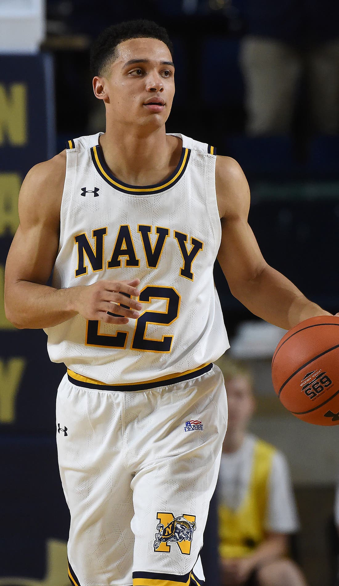 View from a seat at a Navy Midshipmen Mens Basketball vs Colgate Raiders Mens Basketball game, showing the teams playing