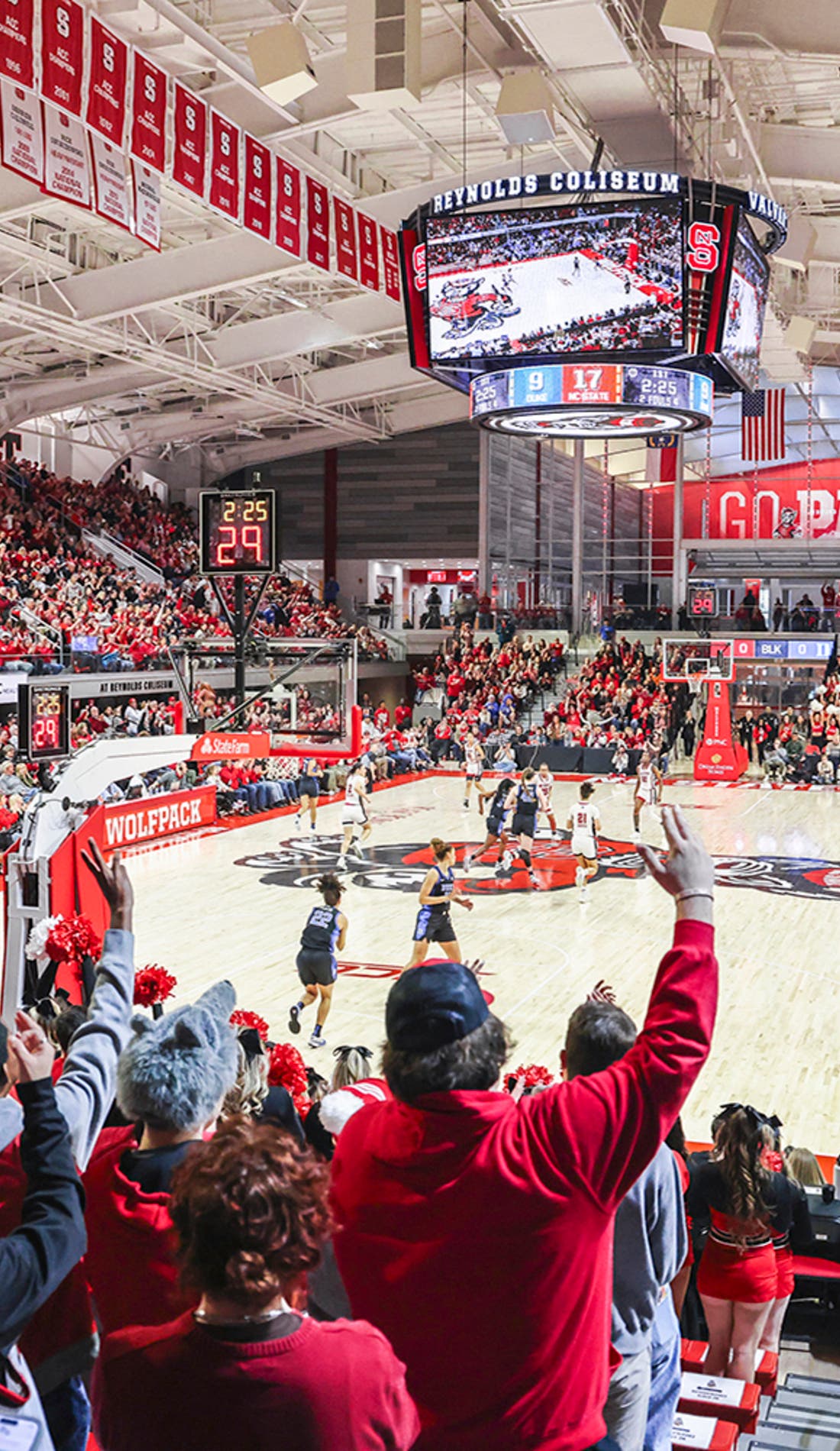View from a seat at a NC State Wolfpack Womens Basketball vs Virginia Tech Hokies Womens Basketball game, showing the teams playing