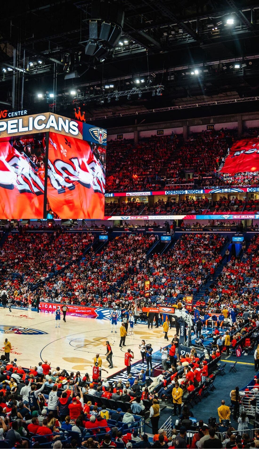 View from a seat at a New Orleans Pelicans vs San Antonio Spurs game, showing the teams playing