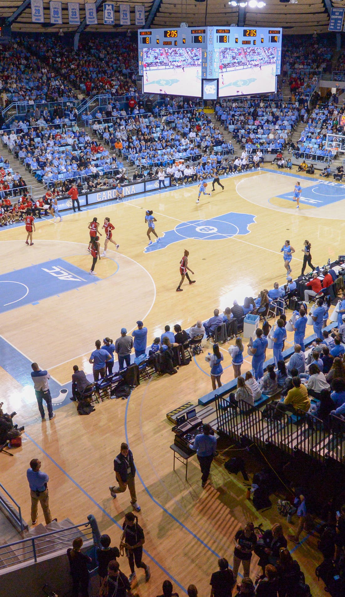 View from a seat at a North Carolina Tar Heels Womens Basketball vs Michigan Wolverines Womens Basketball game, showing the teams playing