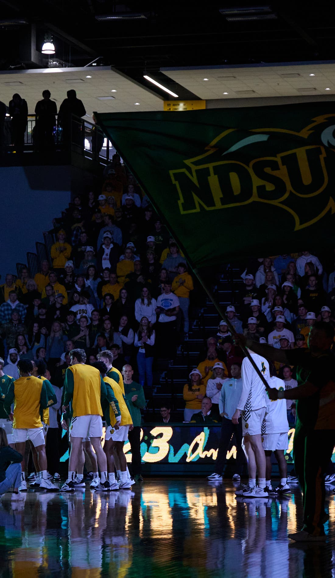 View from a seat at a North Dakota State Bison Mens Basketball vs Akron Zips Mens Basketball game, showing the teams playing