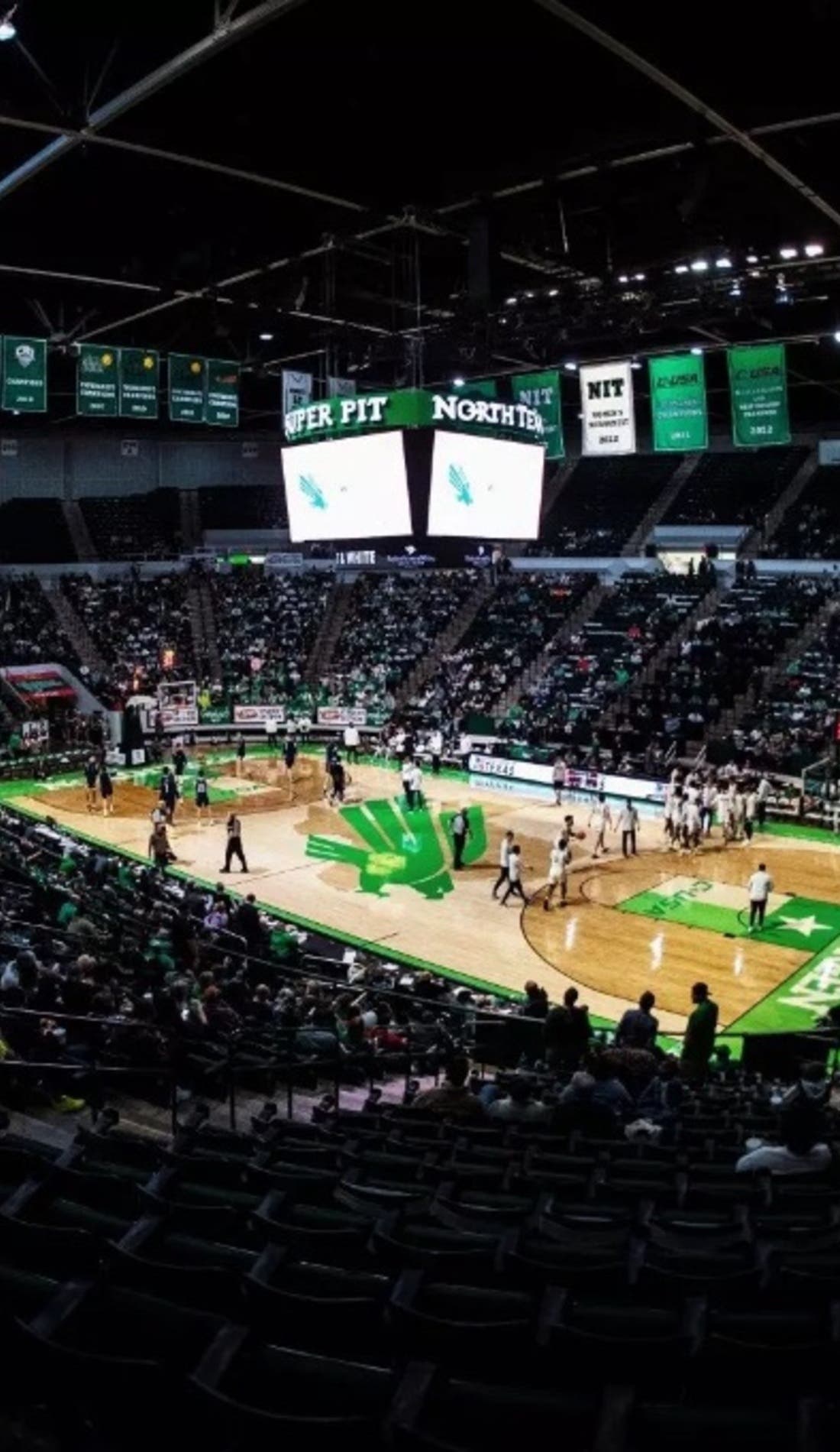 View from a seat at a North Texas Mean Green Mens Basketball vs Lehigh Mountain Hawks Mens Basketball game, showing the teams playing