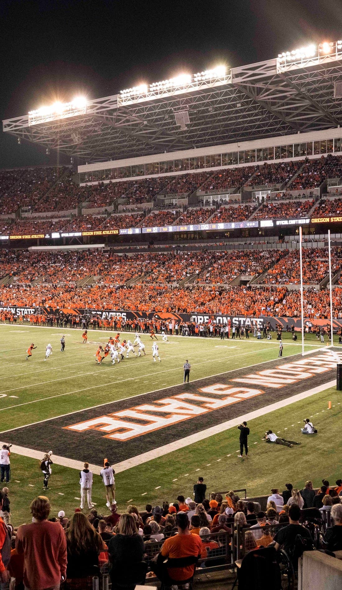 View from a seat at a Oregon State Beavers Football vs USC Trojans Football game, showing the teams playing