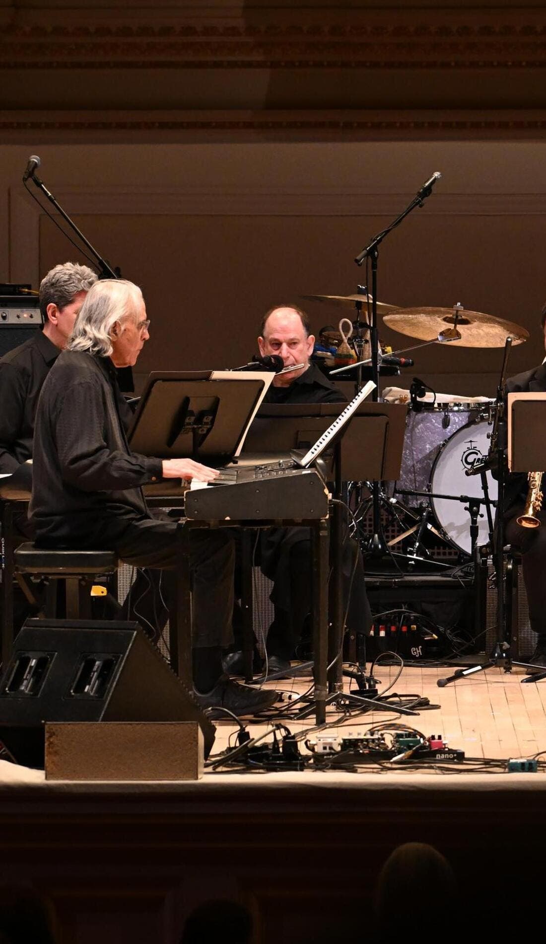 Philip Glass Ensemble promotional image for upcoming events and ticket sales