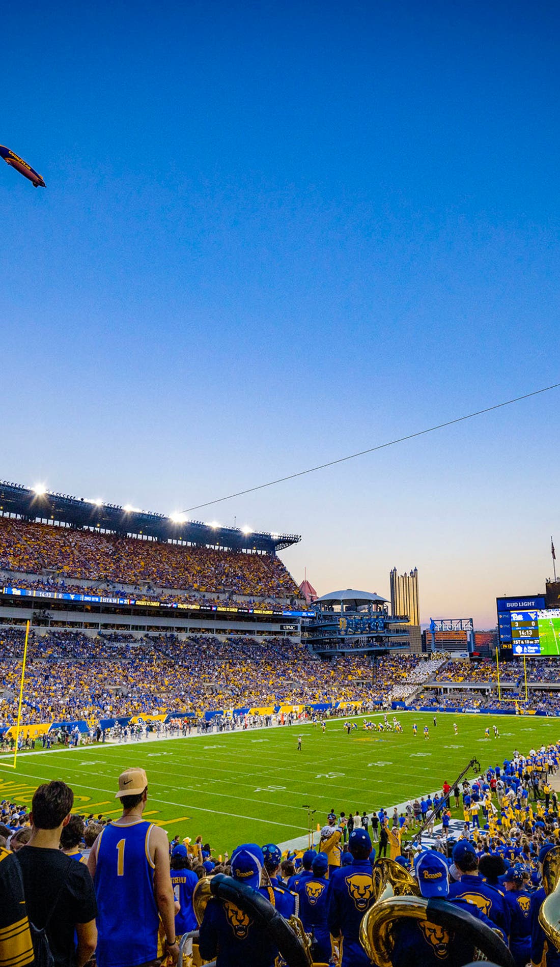 View from a seat at a Pittsburgh Panthers Football vs Youngstown State Penguins Football game, showing the teams playing